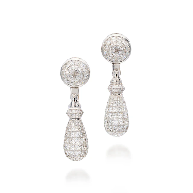 A Pair of Diamond and White Gold Day/Night Earrings