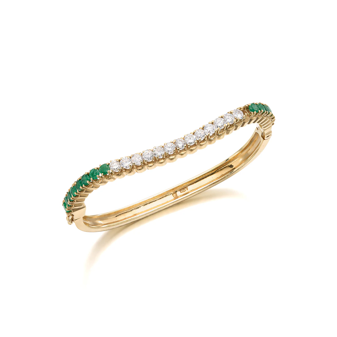 An Emerald, Diamond and Gold Bangle Bracelet