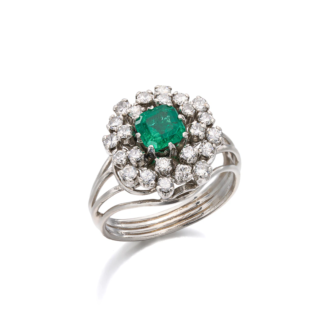An Emerald, Diamond and Platinum Ring