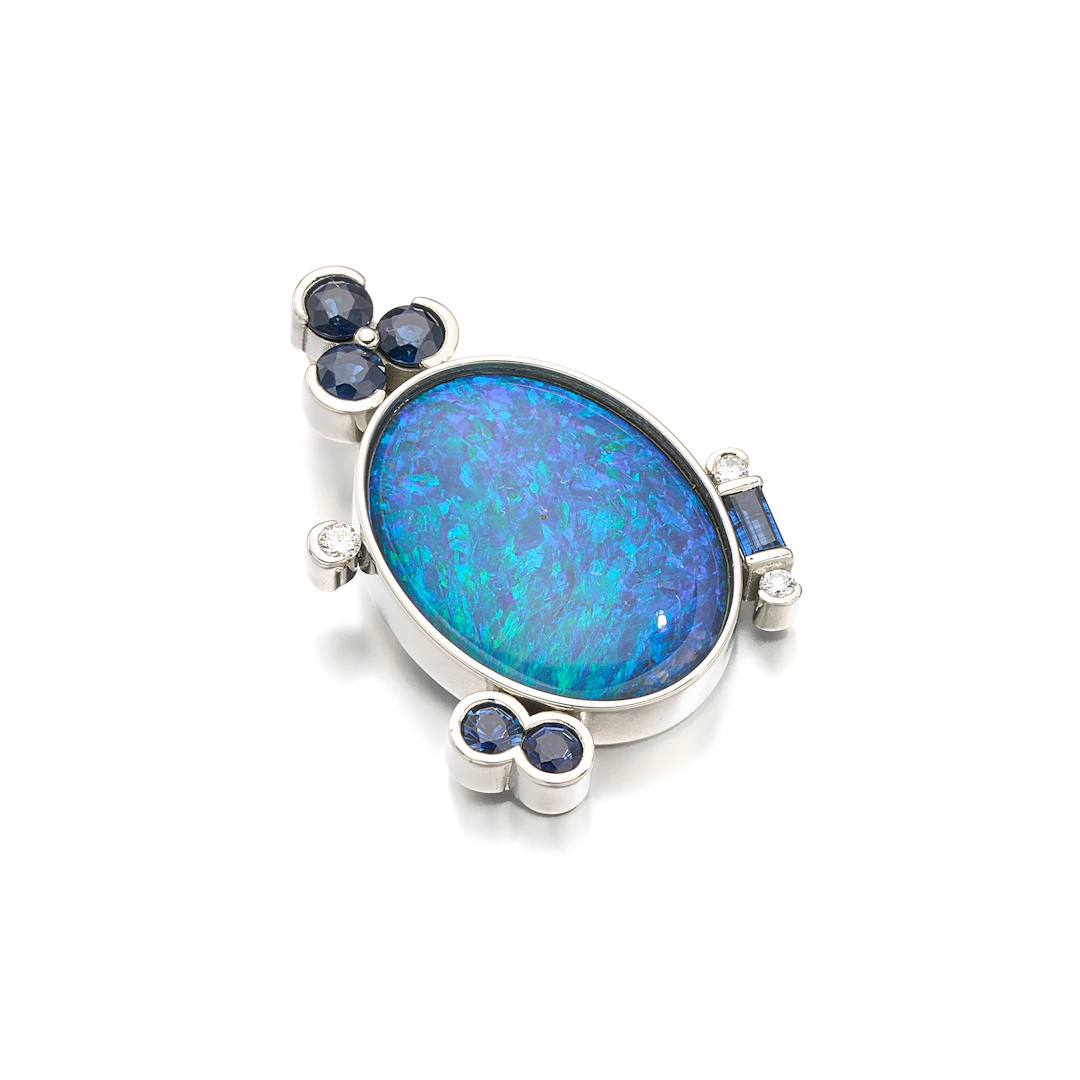 A Black Opal, Sapphire, Diamond and White Gold Pendant, by Pure Brilliance
