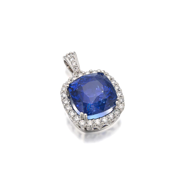 A Sapphire, Diamond and White Gold Pendant