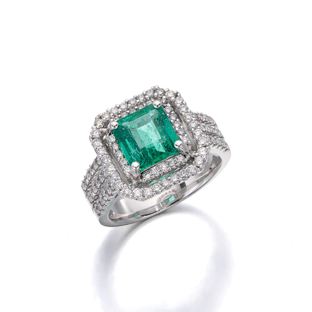 An Emerald, Diamond and White Gold Ring