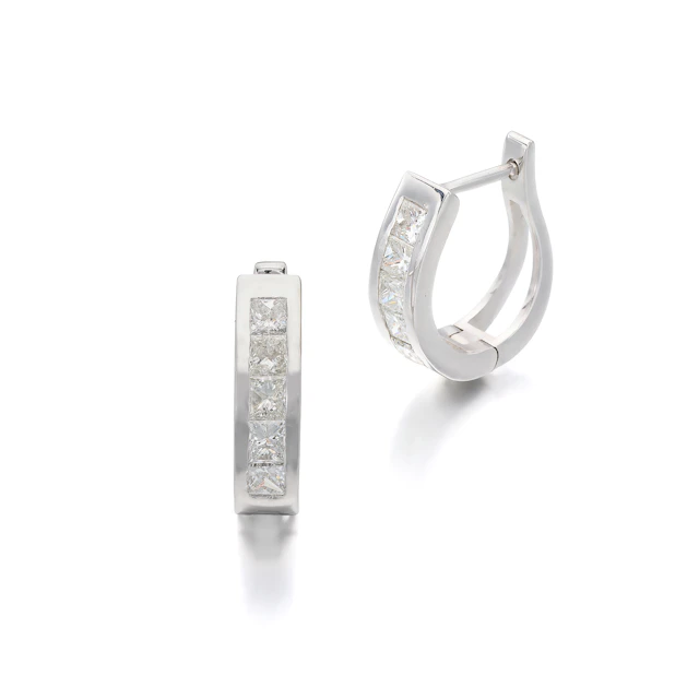 A Pair of Diamond and White Gold Earrings