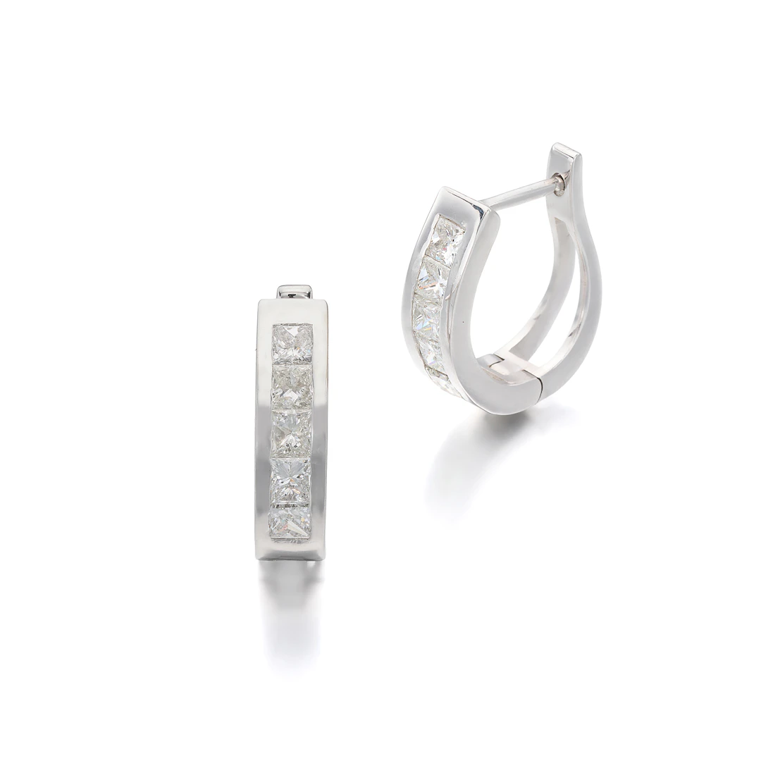 A Pair of Diamond and White Gold Earrings