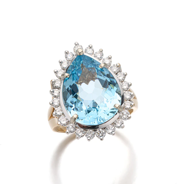 An Aquamarine, Diamond and Gold Ring