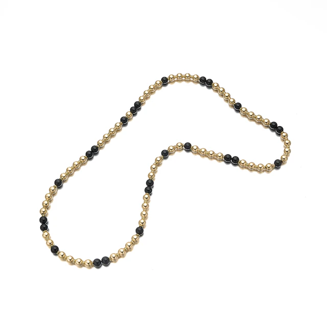 An Onyx and Gold Bead Necklace