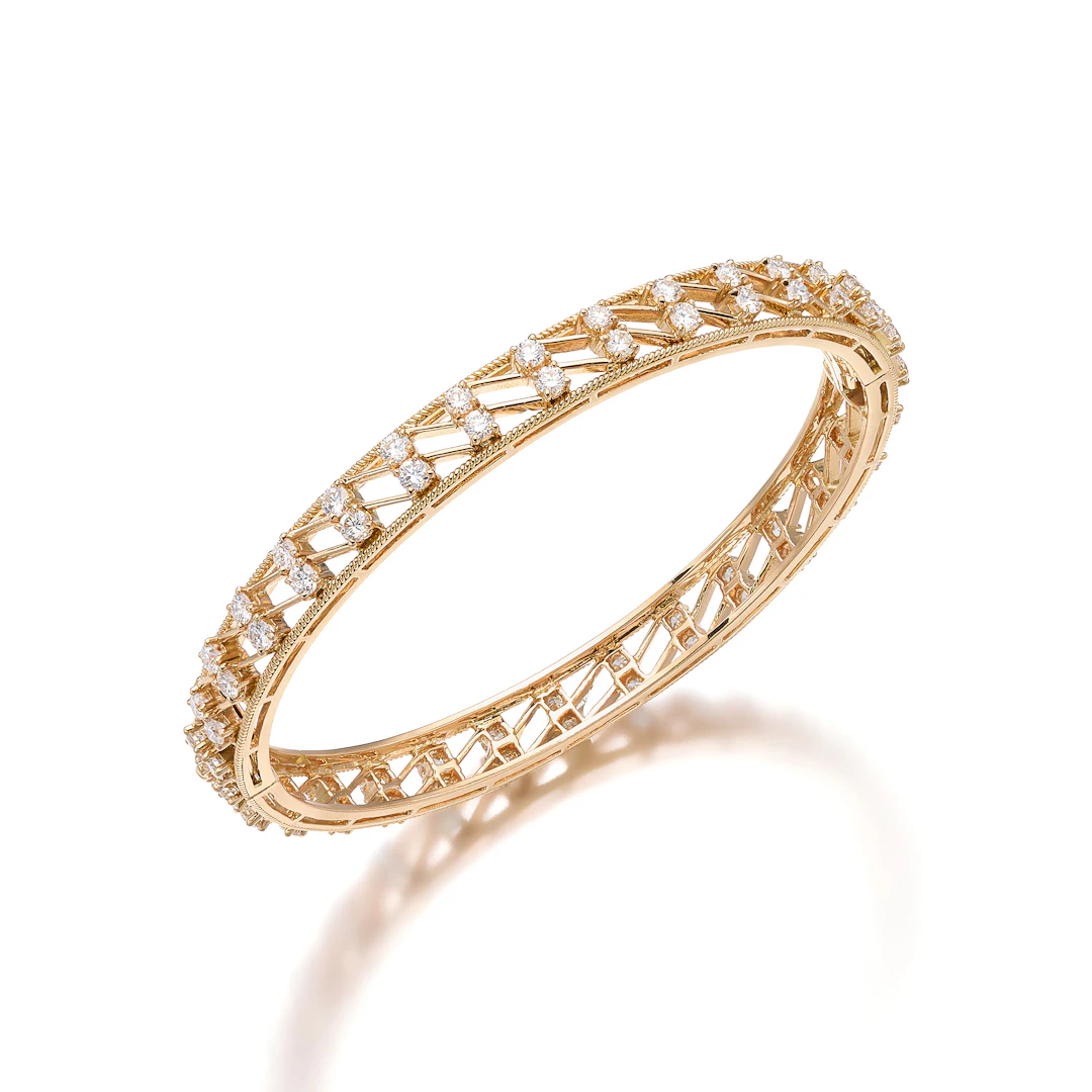 A Diamond and Gold Bangle Bracelet