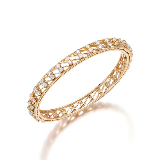 A Diamond and Gold Bangle Bracelet