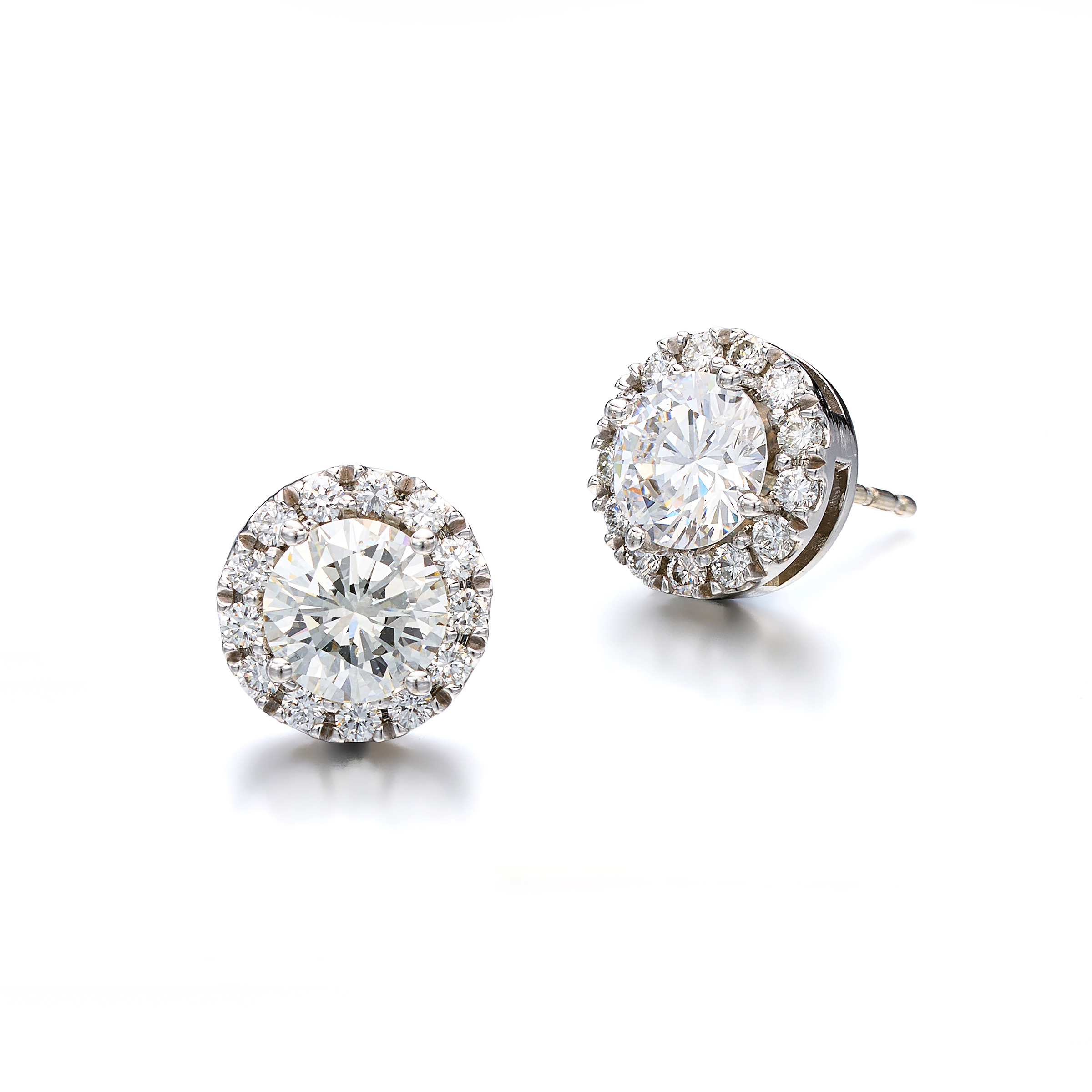 A Pair of Diamond and White Gold Ear Studs