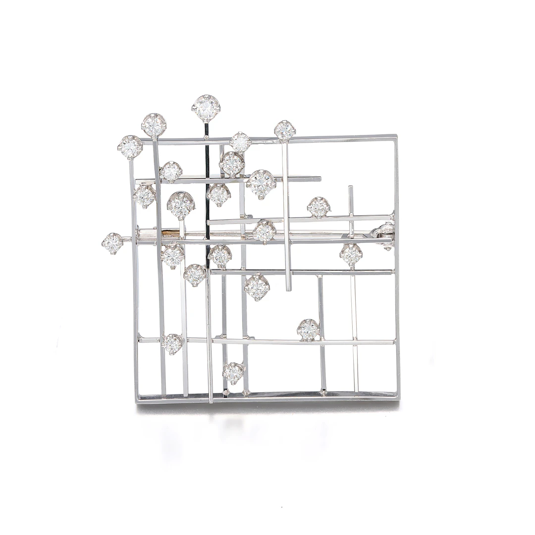 A Diamond and White Gold Brooch/Pendant