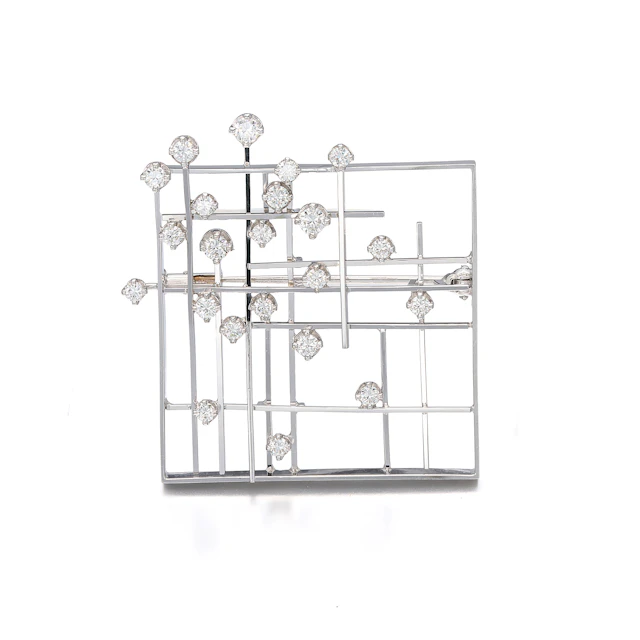 A Diamond and White Gold Brooch/Pendant