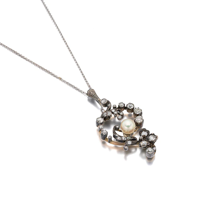 An Antique Pearl, Diamond, Silver and Gold Pendant Necklace