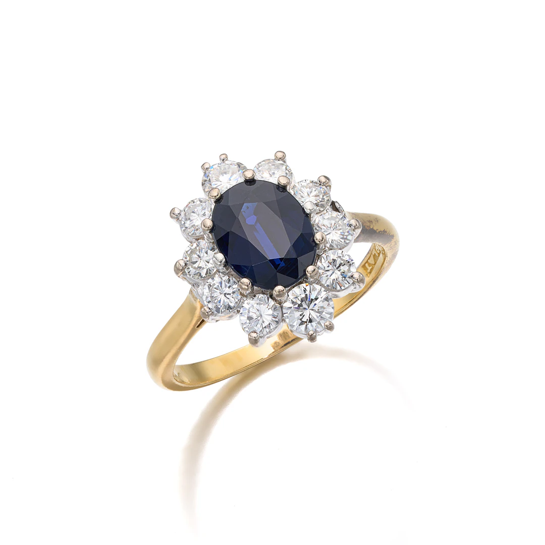 A Sapphire, Diamond, Platinum and Gold Ring