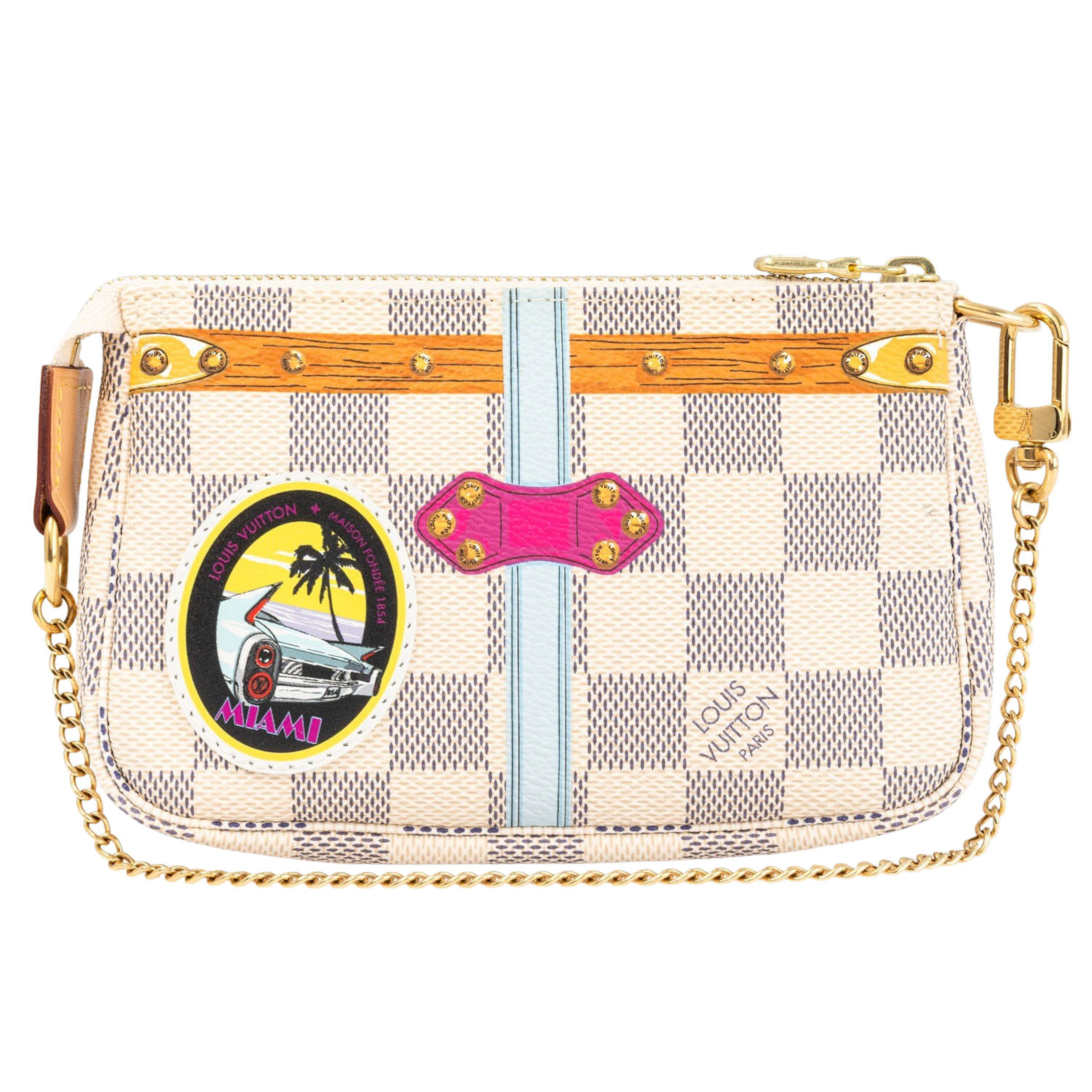 LOUIS VUITTON Pochette "MINI POCHETTE ACC.".