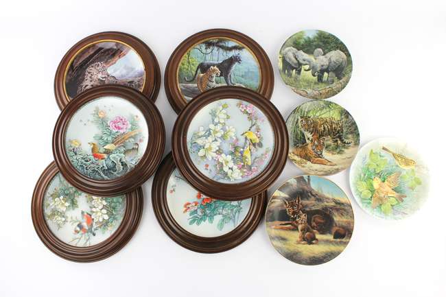 Four Chinese porcelain plates, decorated with birds in branches, inscribed