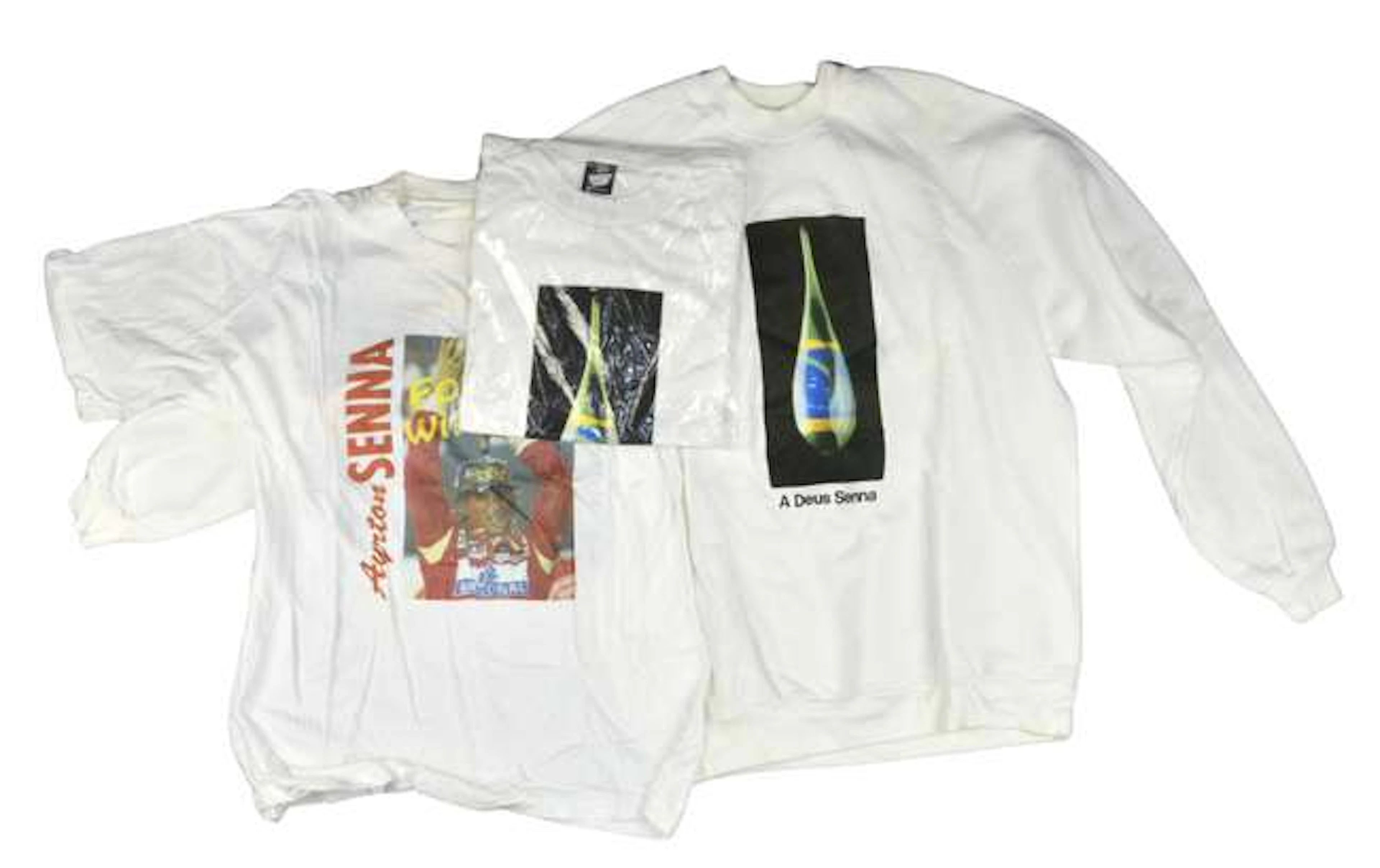 A pair of rare collectable Ayrton Senna white T-shirts size L/XL and