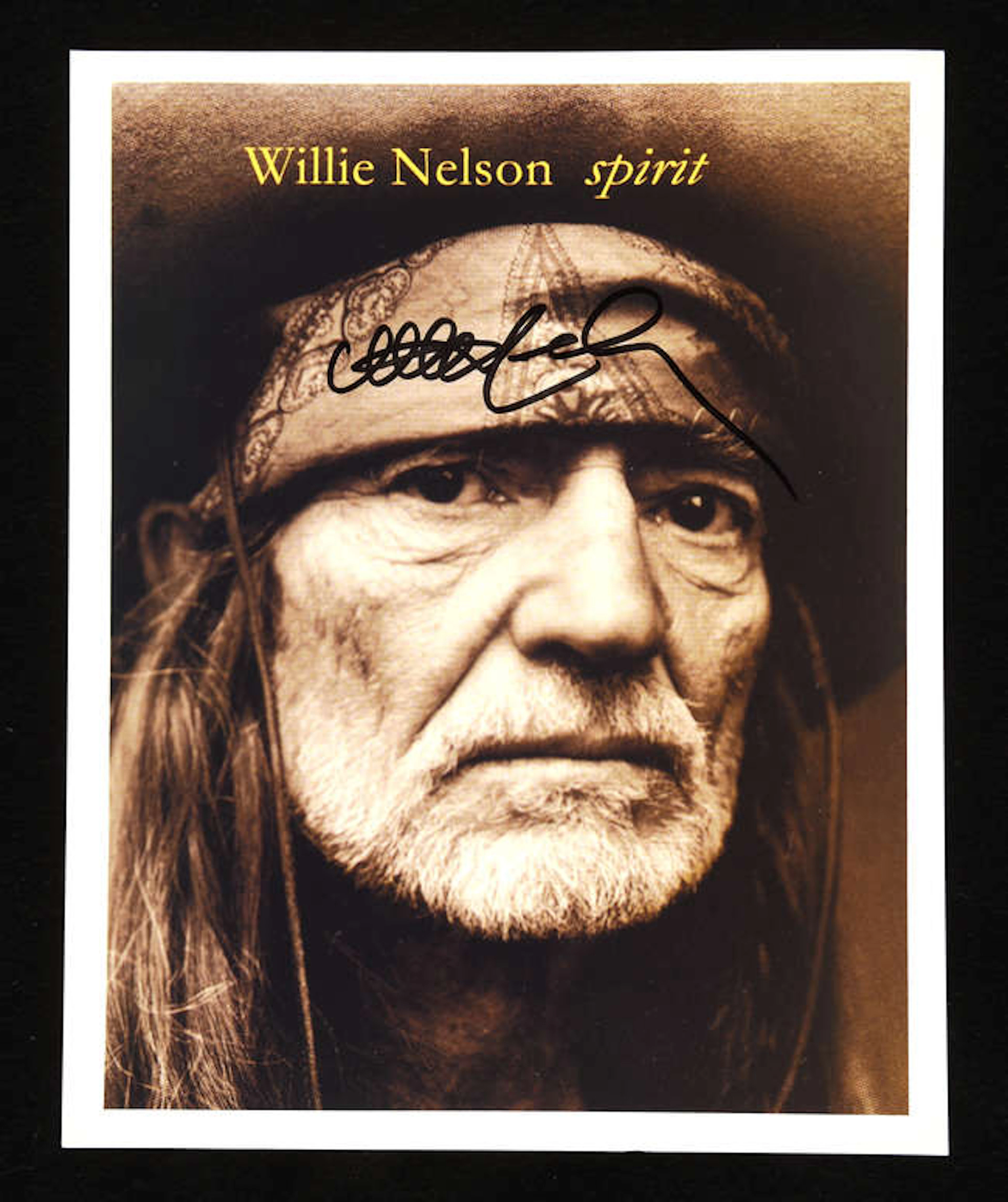Willie Nelson (1933-) Autographed photograph; and Secretarial Typed