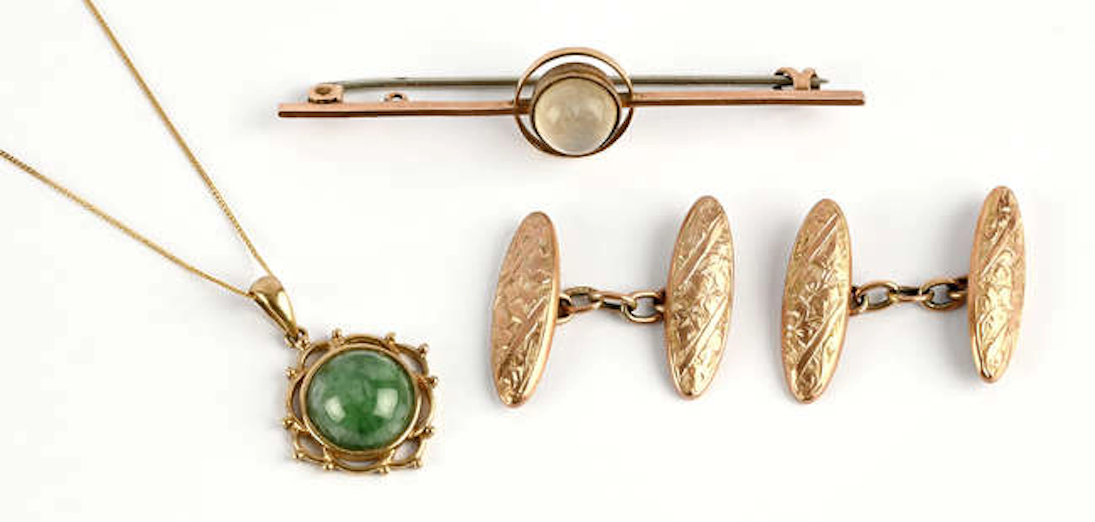 A mixed group of items including a cabochon moonstone bar brooch stamped