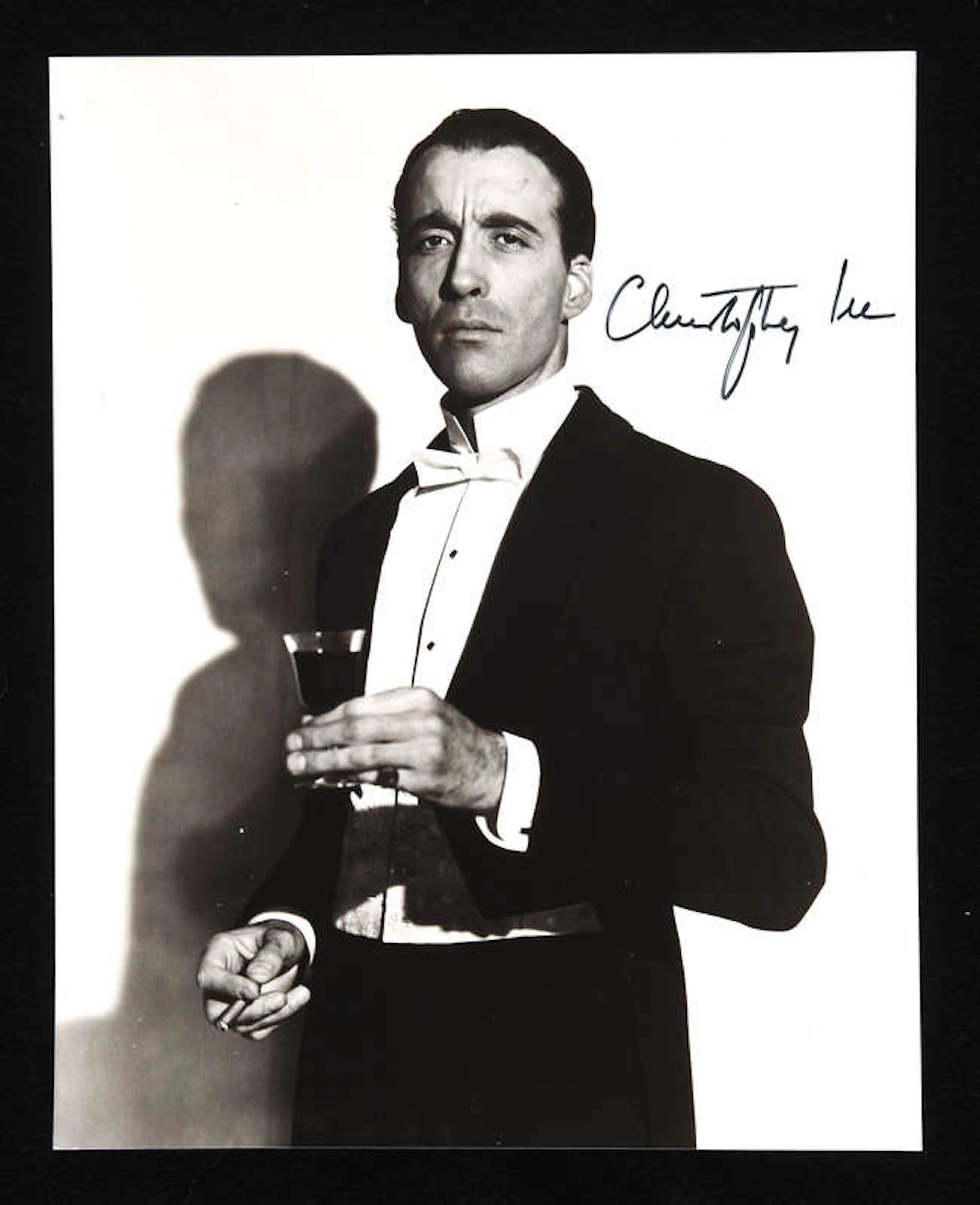 Christopher Lee (1922-2015) Autographed publicity photograph black