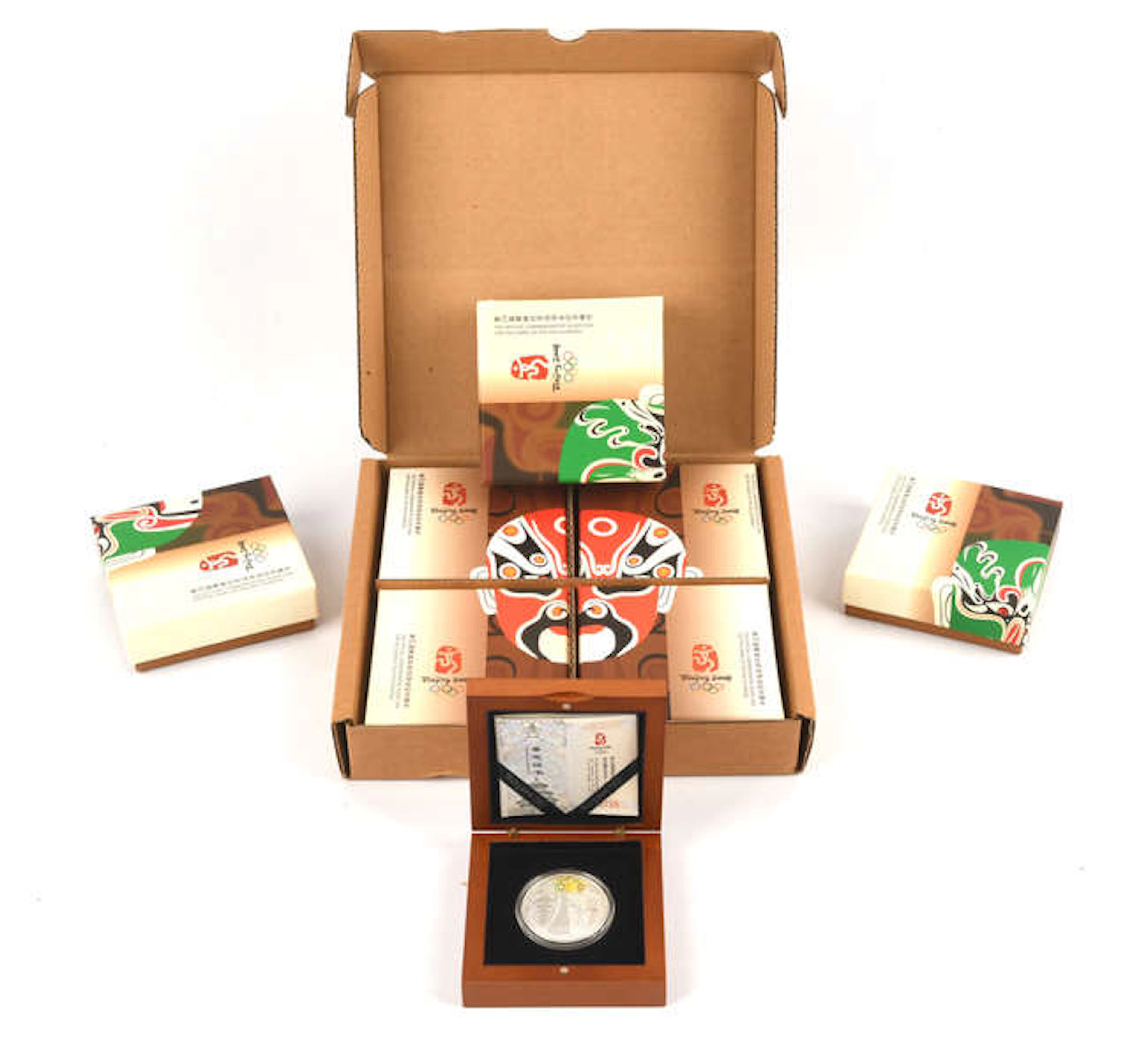 Two silver proof 4-coin sets of Chinese 10 yuan coins issued for the
