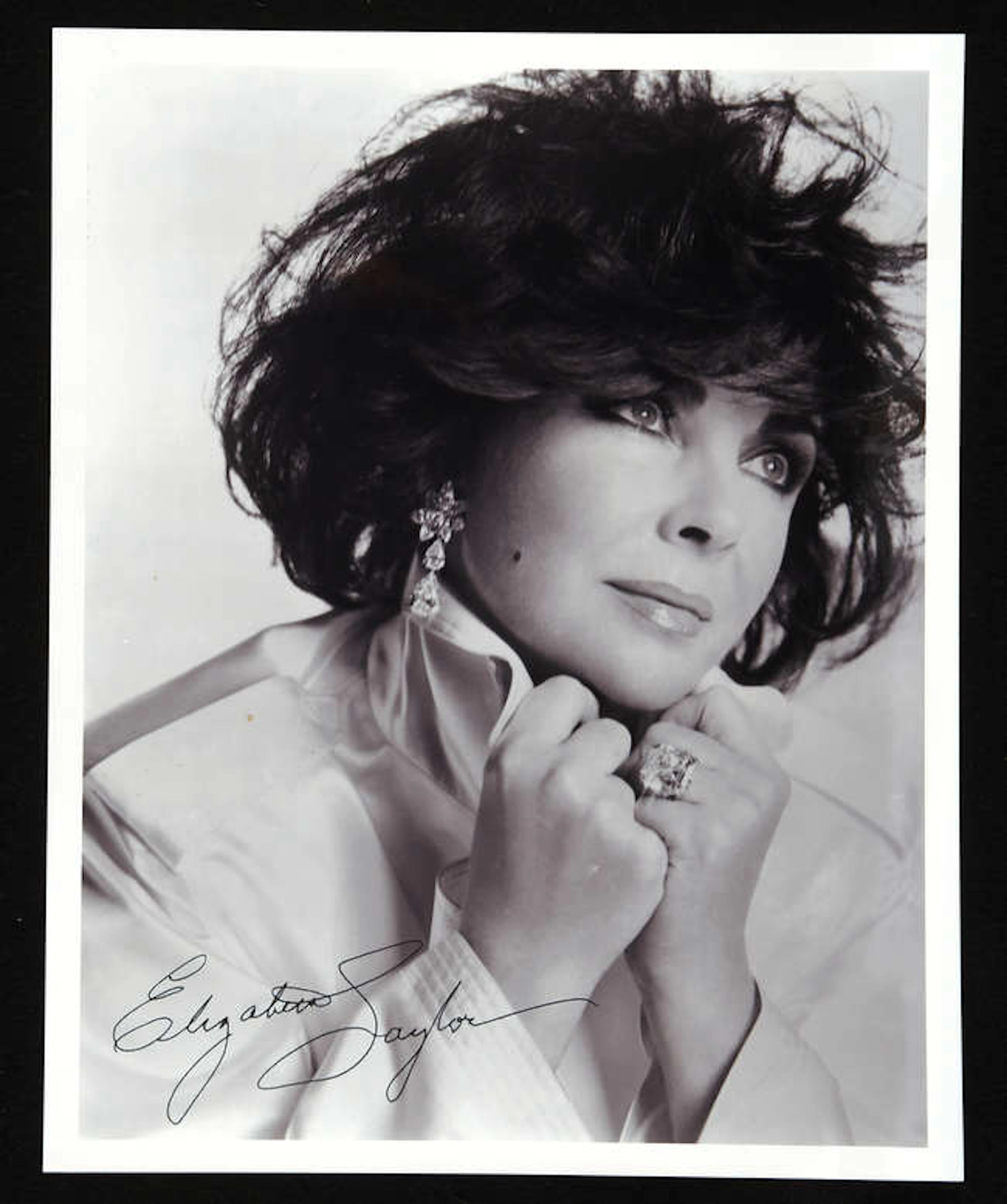 Elizabeth Taylor (1932-2011) Autographed black and white photograph