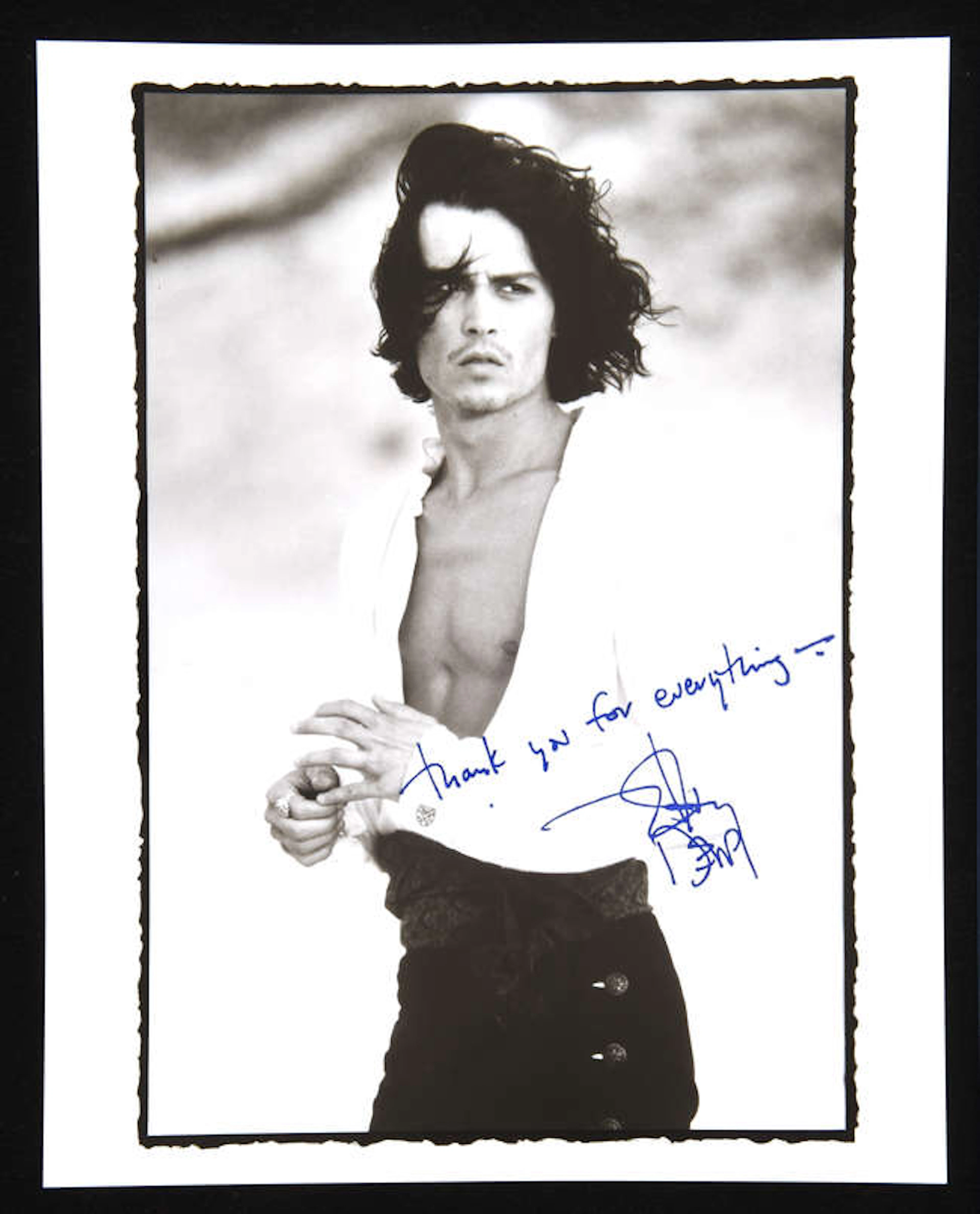 Johnny Depp (1963-) A Pair of Autographs the first: a black and white