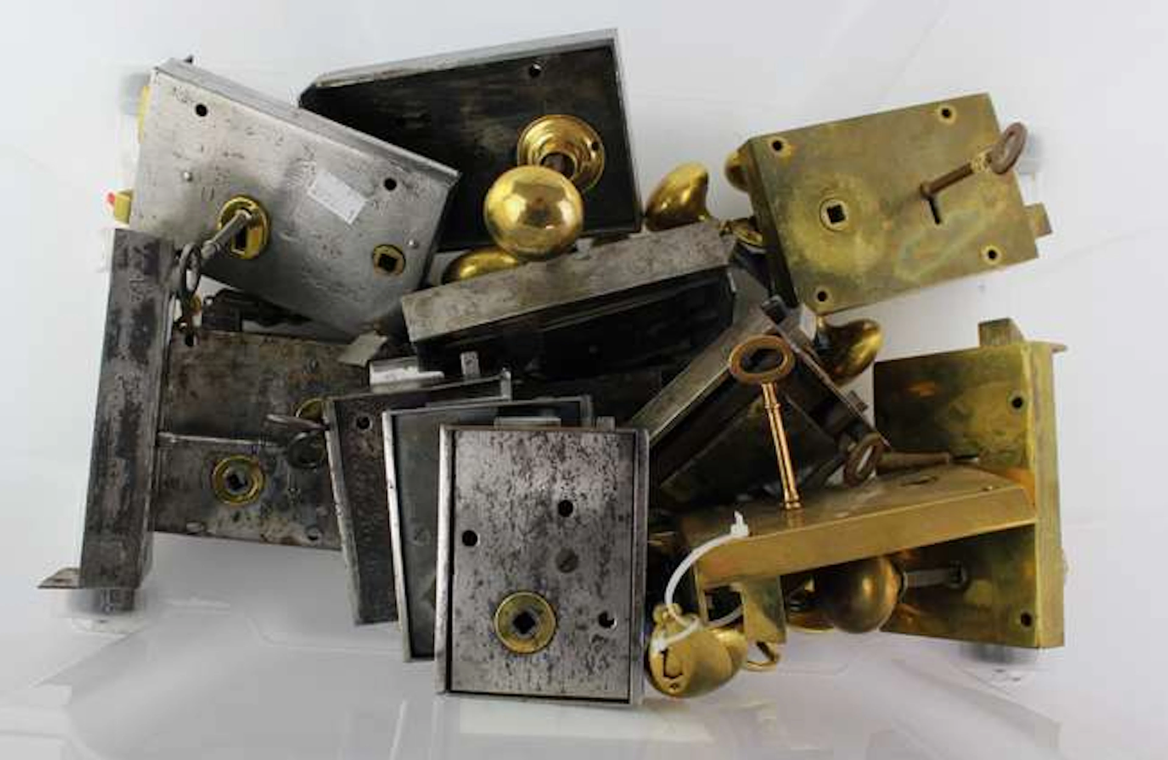 A collection of Regency steel and brass door furniture and locks