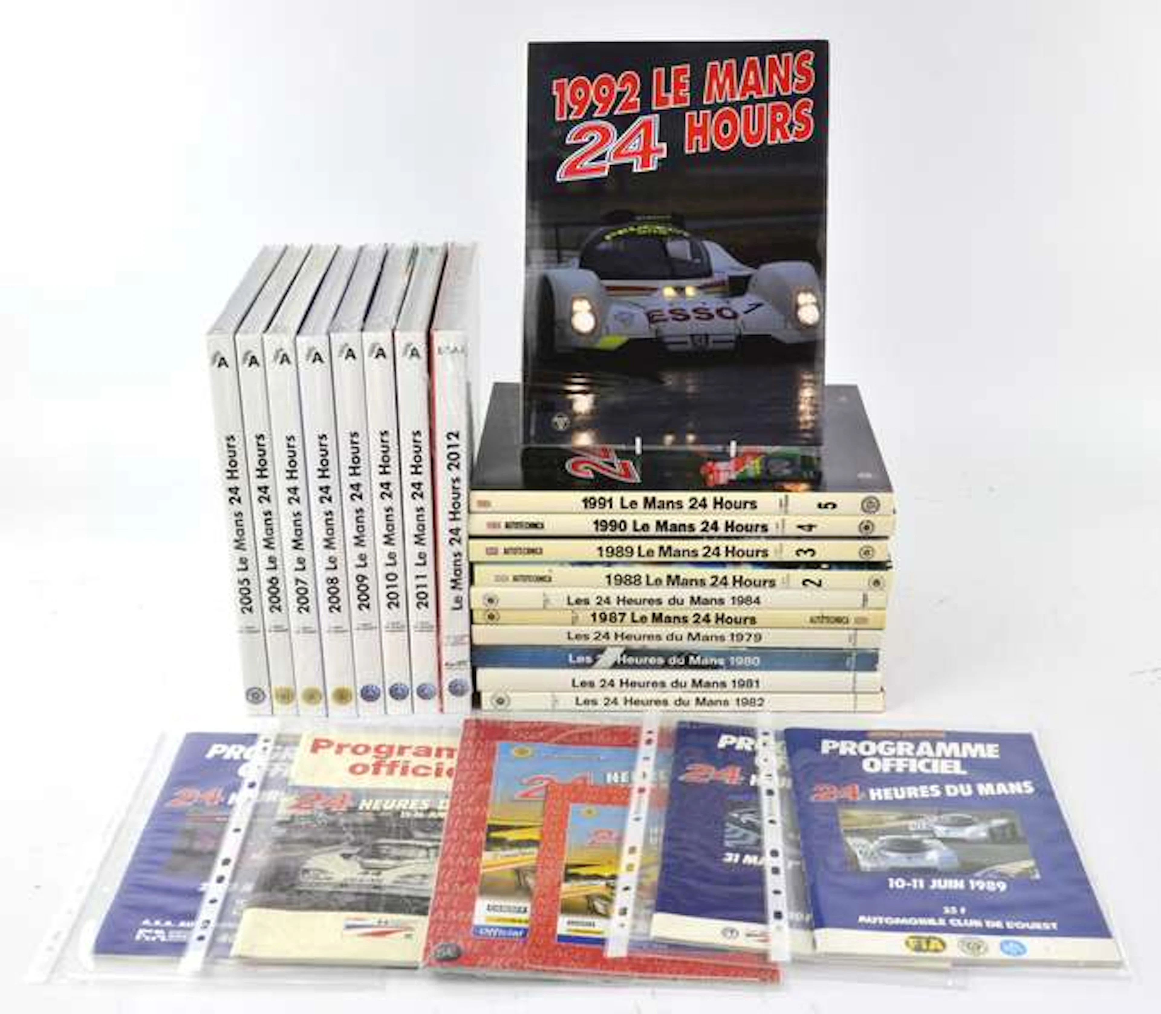 A large collection of 24 Heures Du Mans hard back books and official