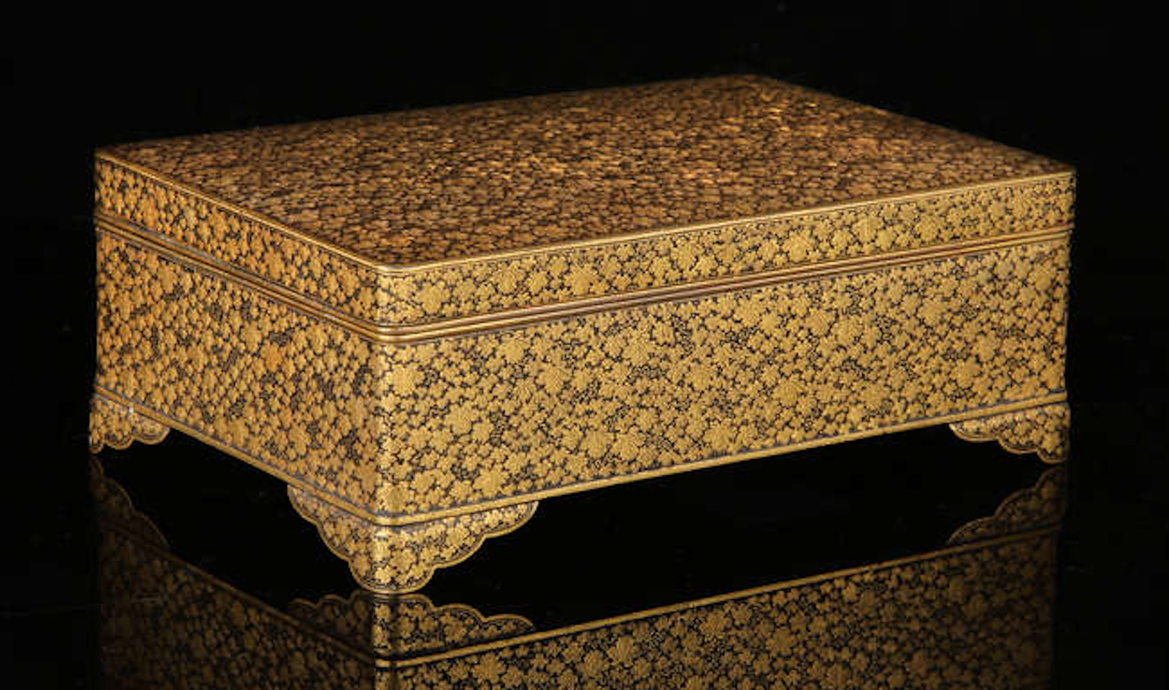 A Komai box with hinged cover and gilt interiors; of rectangular form