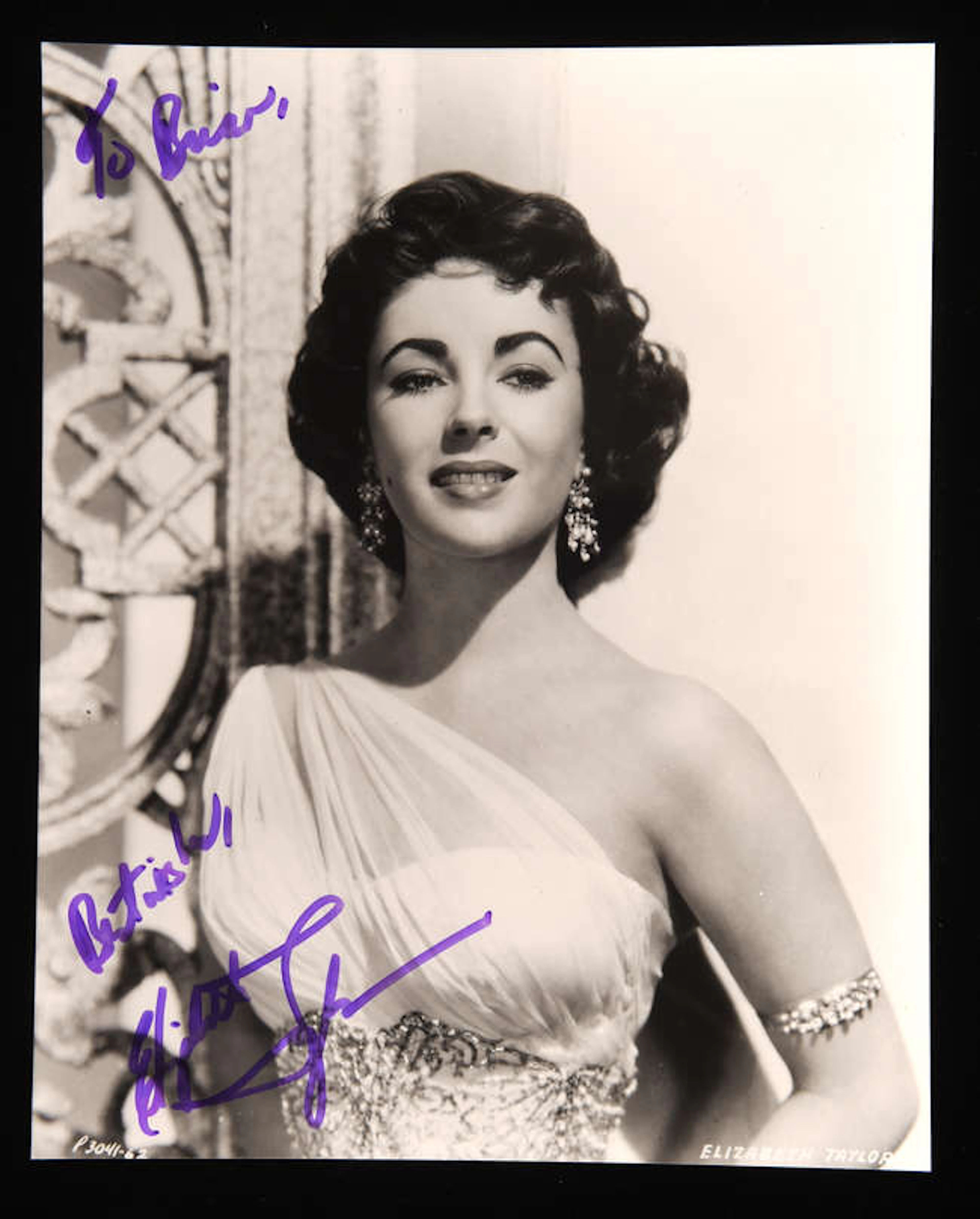 Elizabeth Taylor (1932-2011) Autographed Black and White Portrait