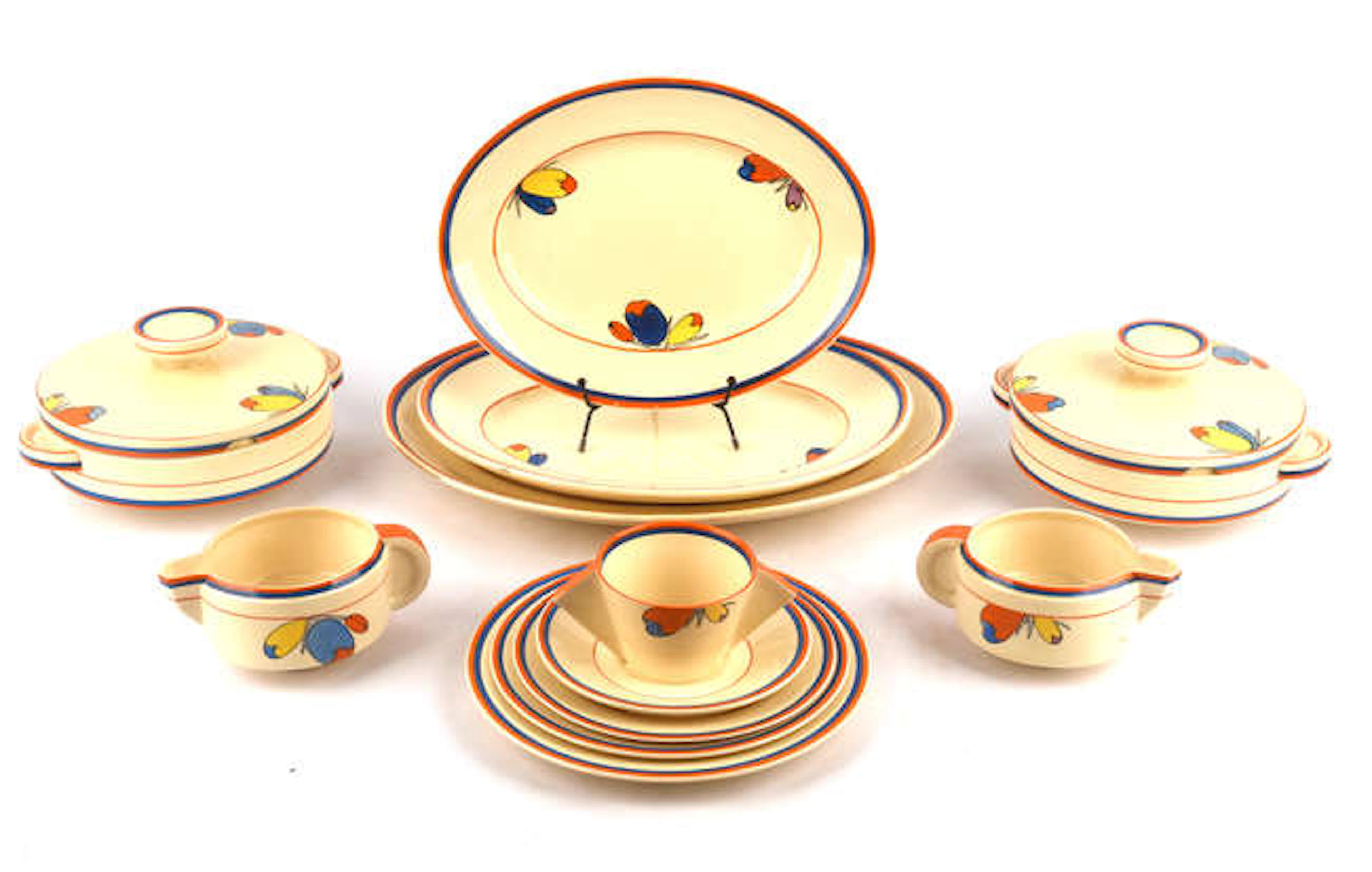 CLARICE CLIFF, (BRITISH, 1899-1972), Flora, a part dinner service