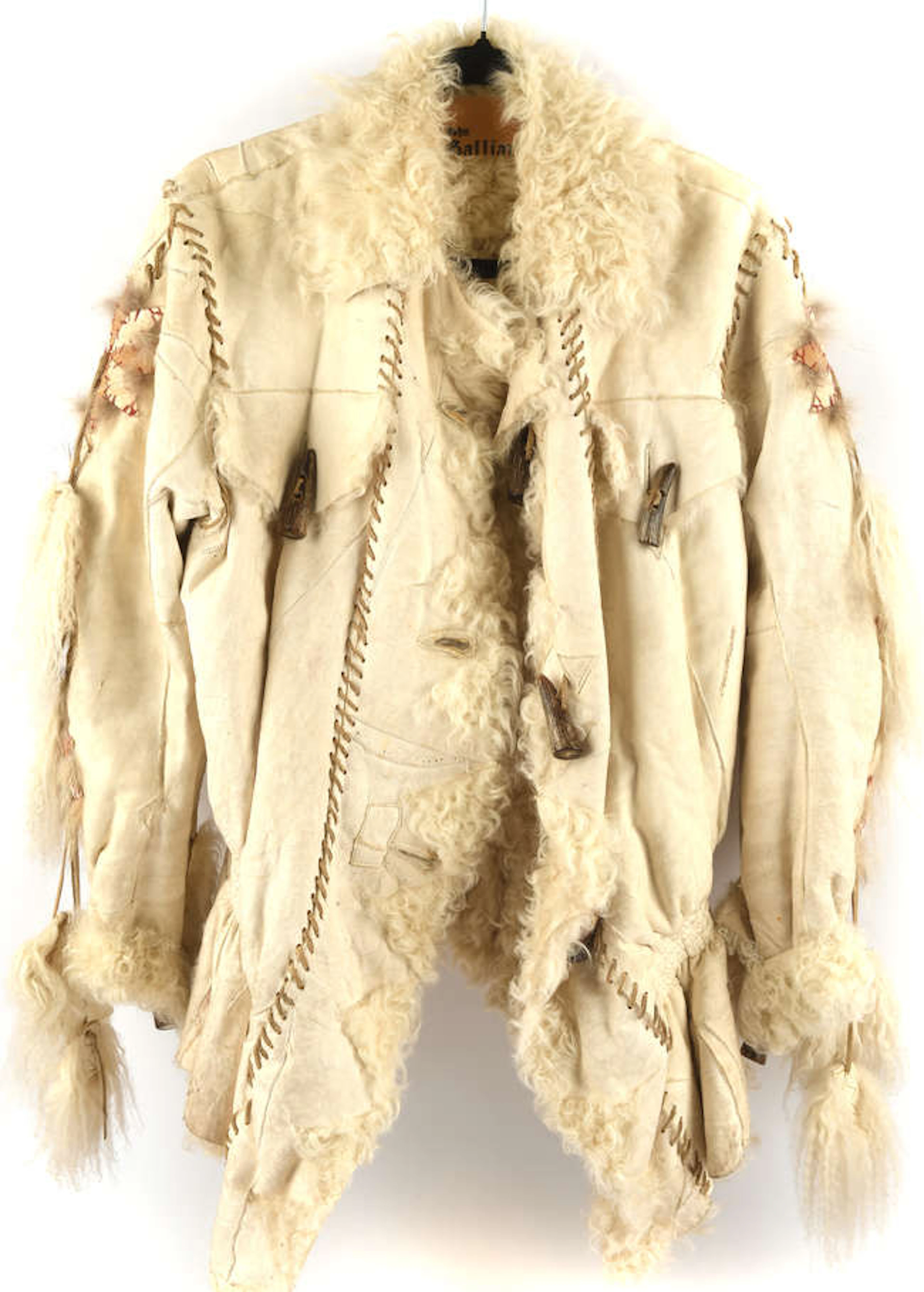 JOHN GALLIANO, a lambs skin coat , GB size 10, with applied stellar