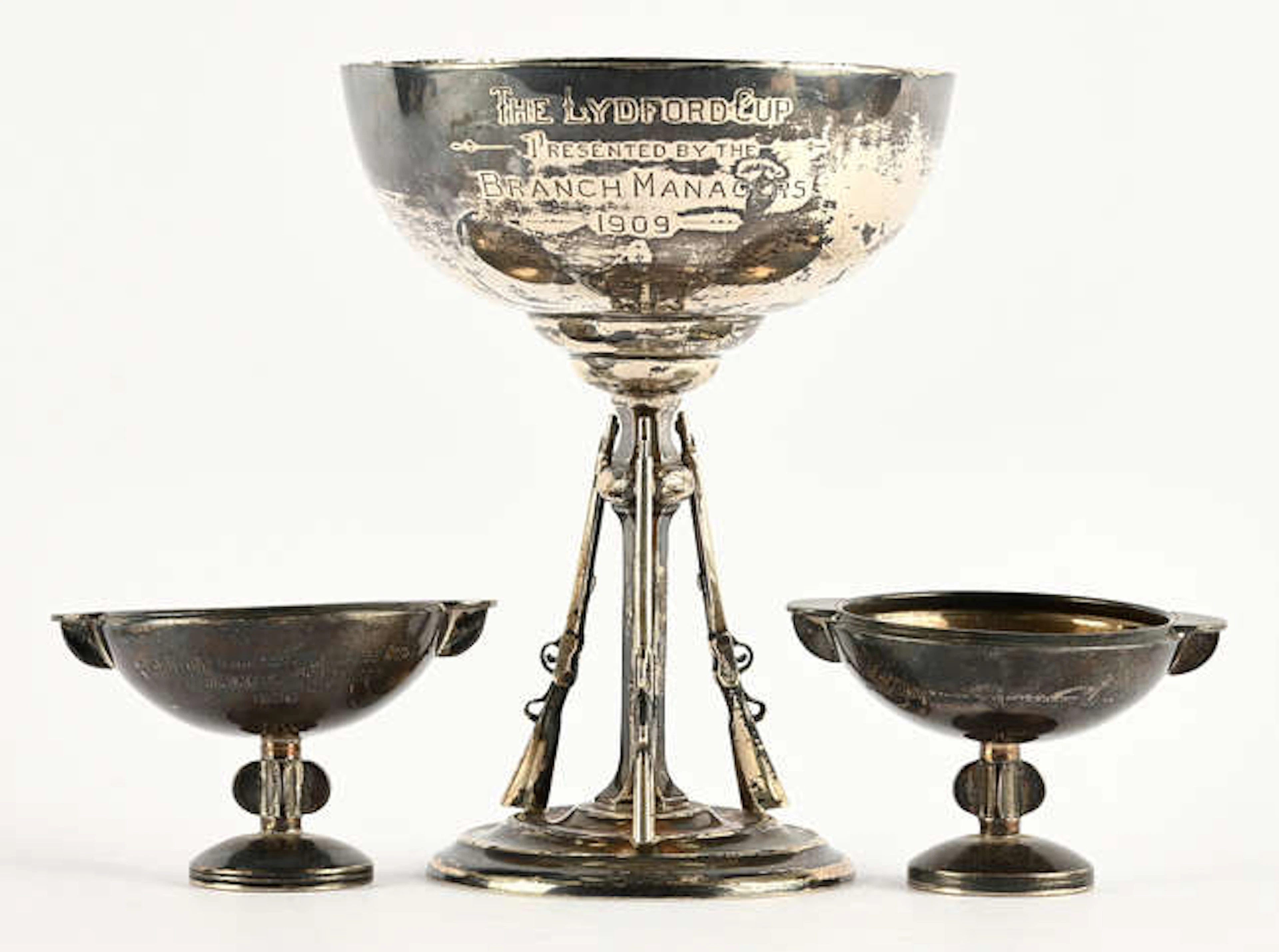 Shooting trophy, by Daniel George Collins, Sheffield 1909, and two