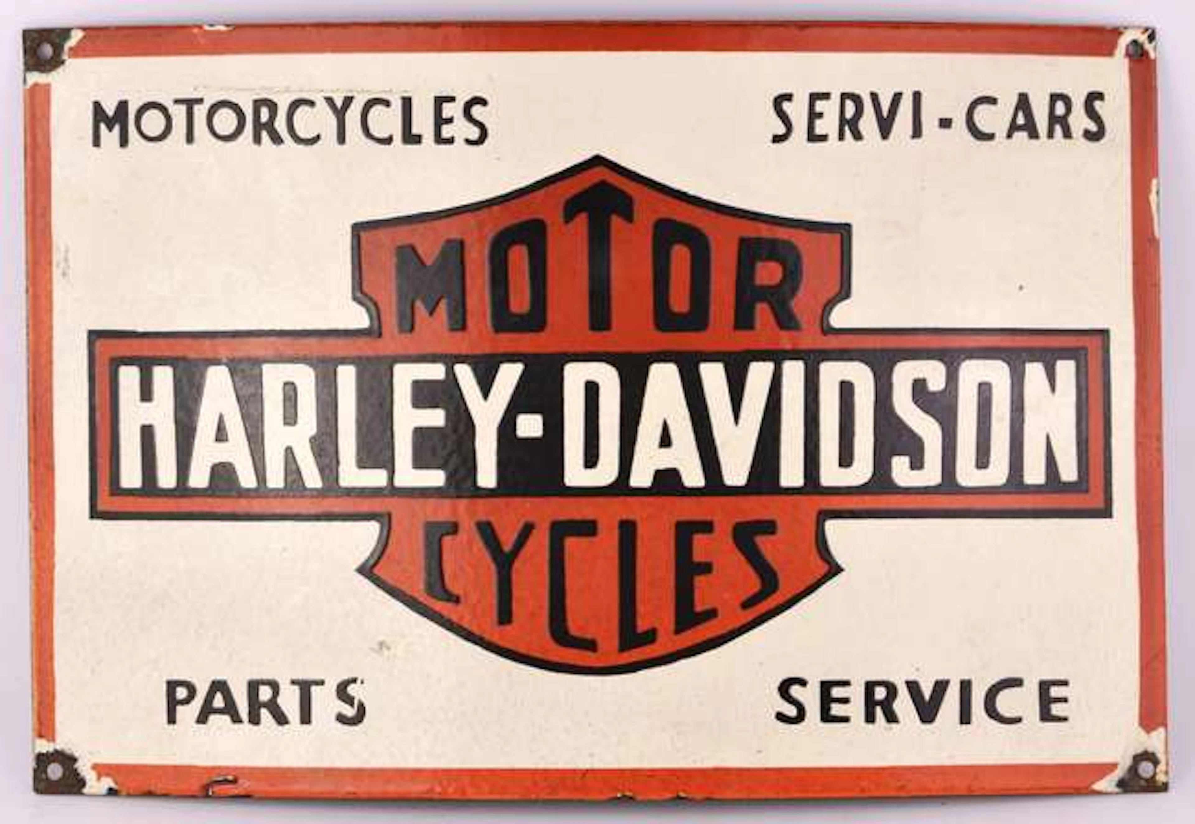 A vintage Harley-Davidson enamel metal sign. 46cms x 30cms.