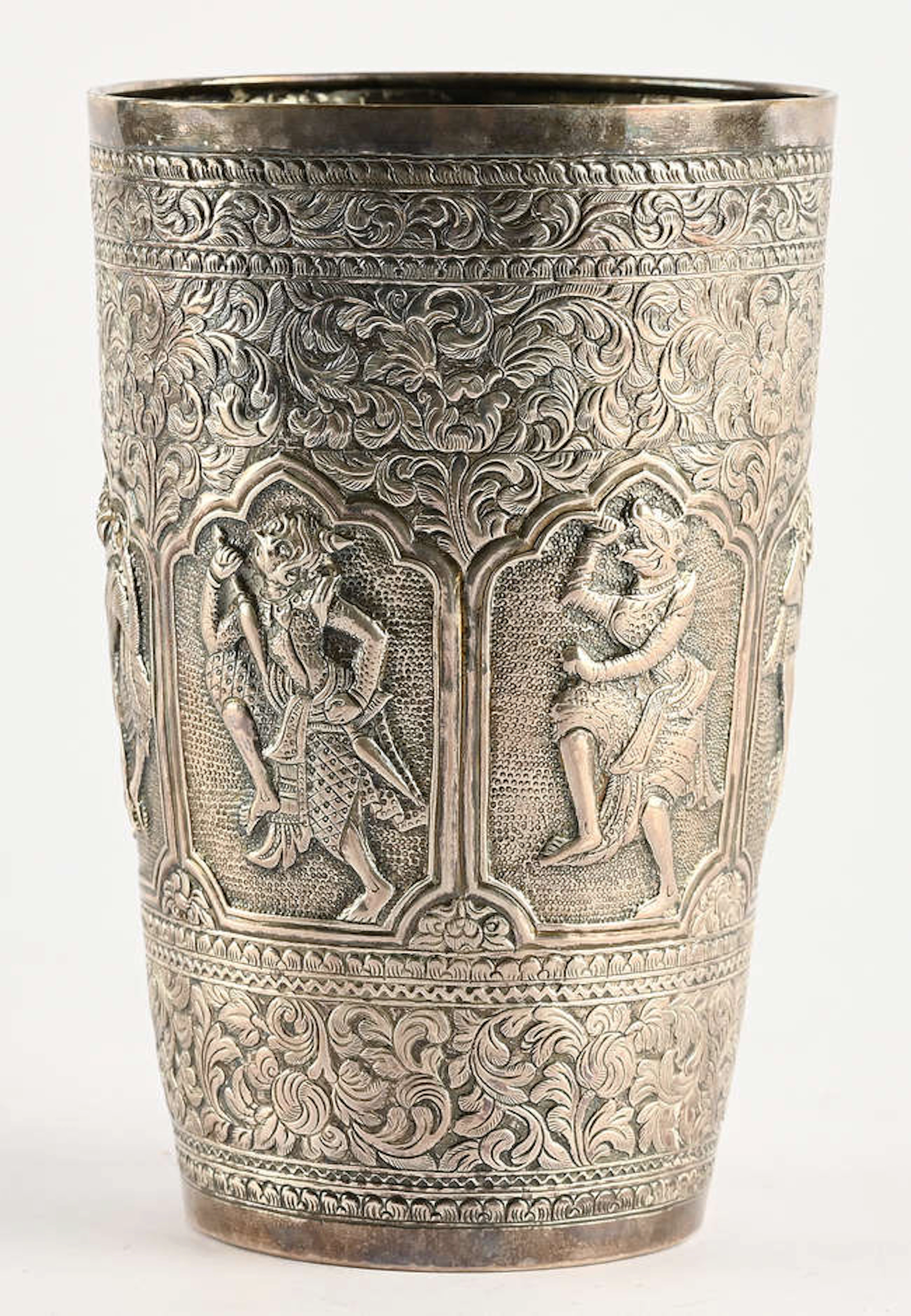 Burmese repousse silver beaker decorated with six dancers as mythical