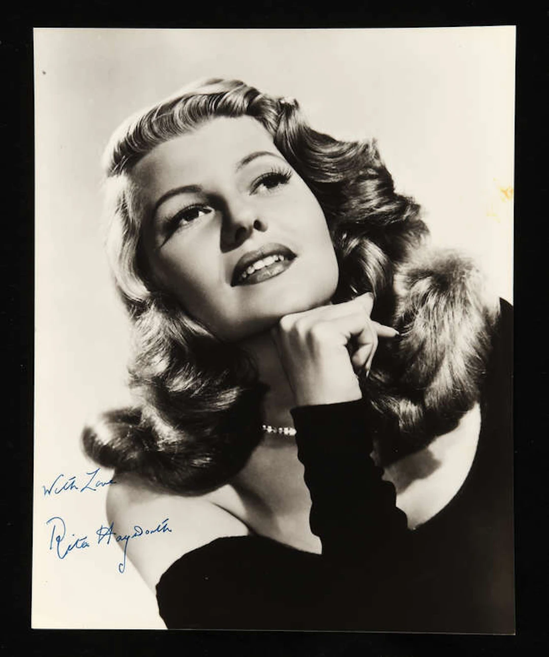 Rita Hayworth (1918-1987) Autographed black and white publicity photograph