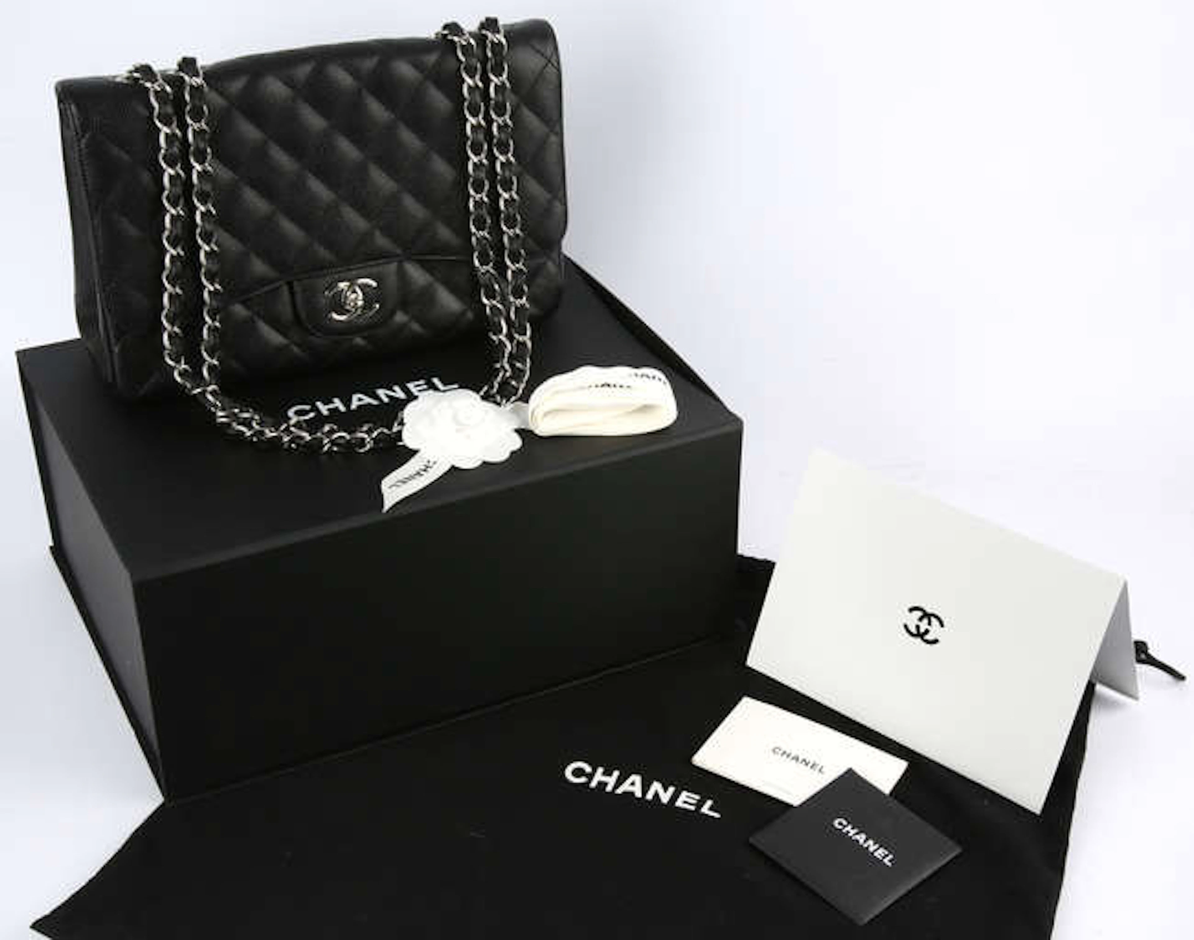 CHANEL, a black quilted caviar leather jumbo flap bag , No. 13379410