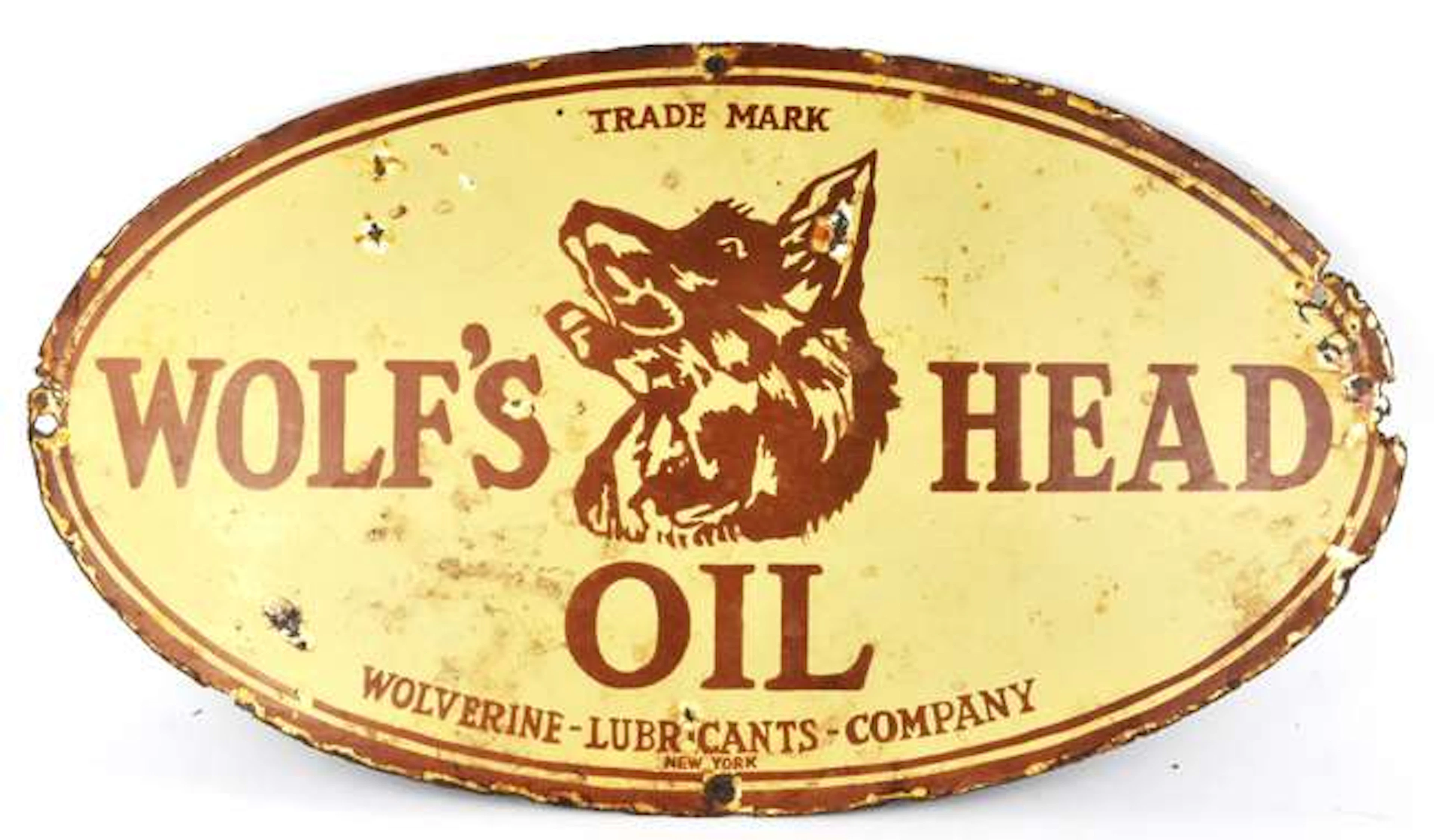 A Wolf's Head Oil enamel metal sign. 69cms x 39cms.