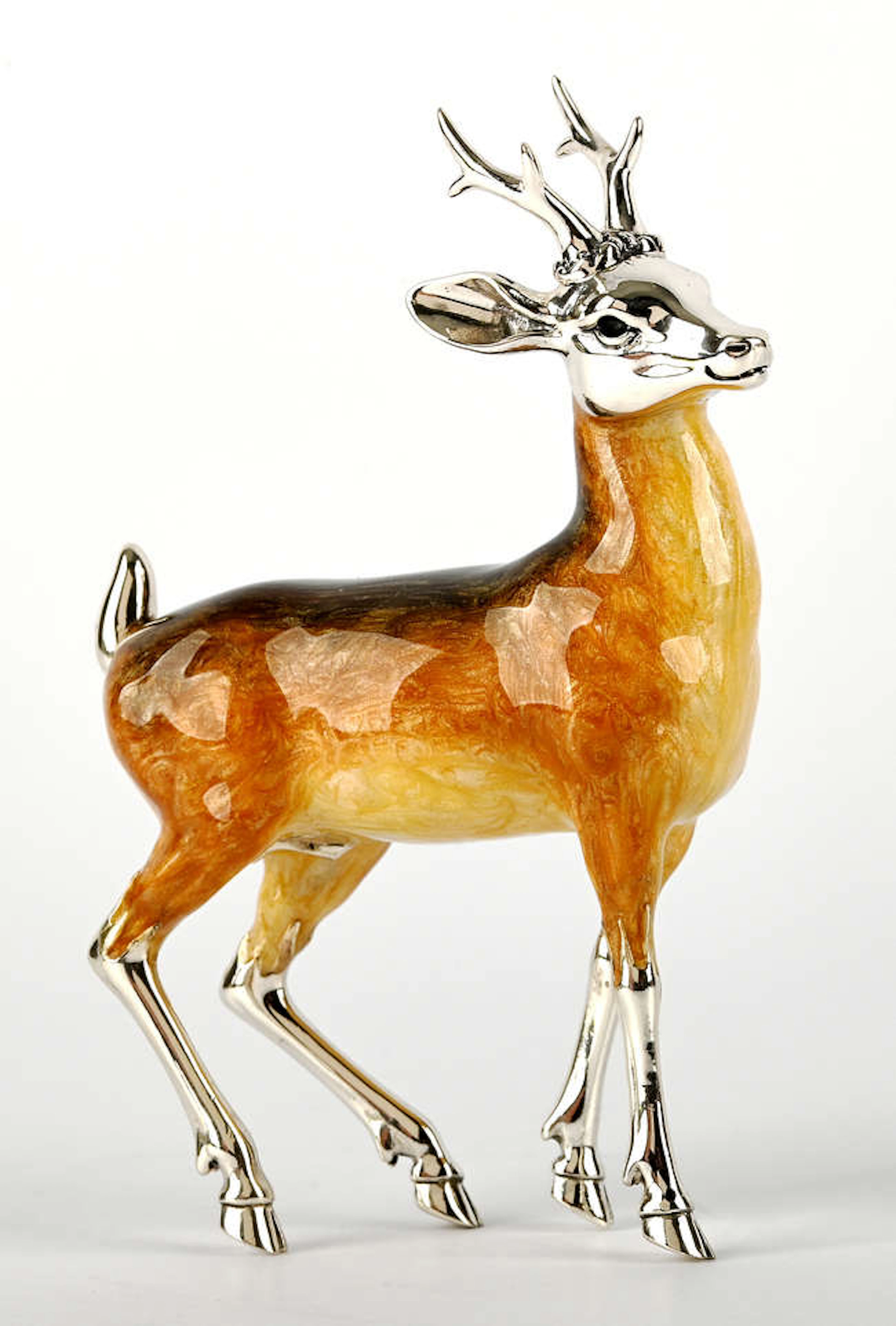 A late 20th century white metal model of a stag with composite body.