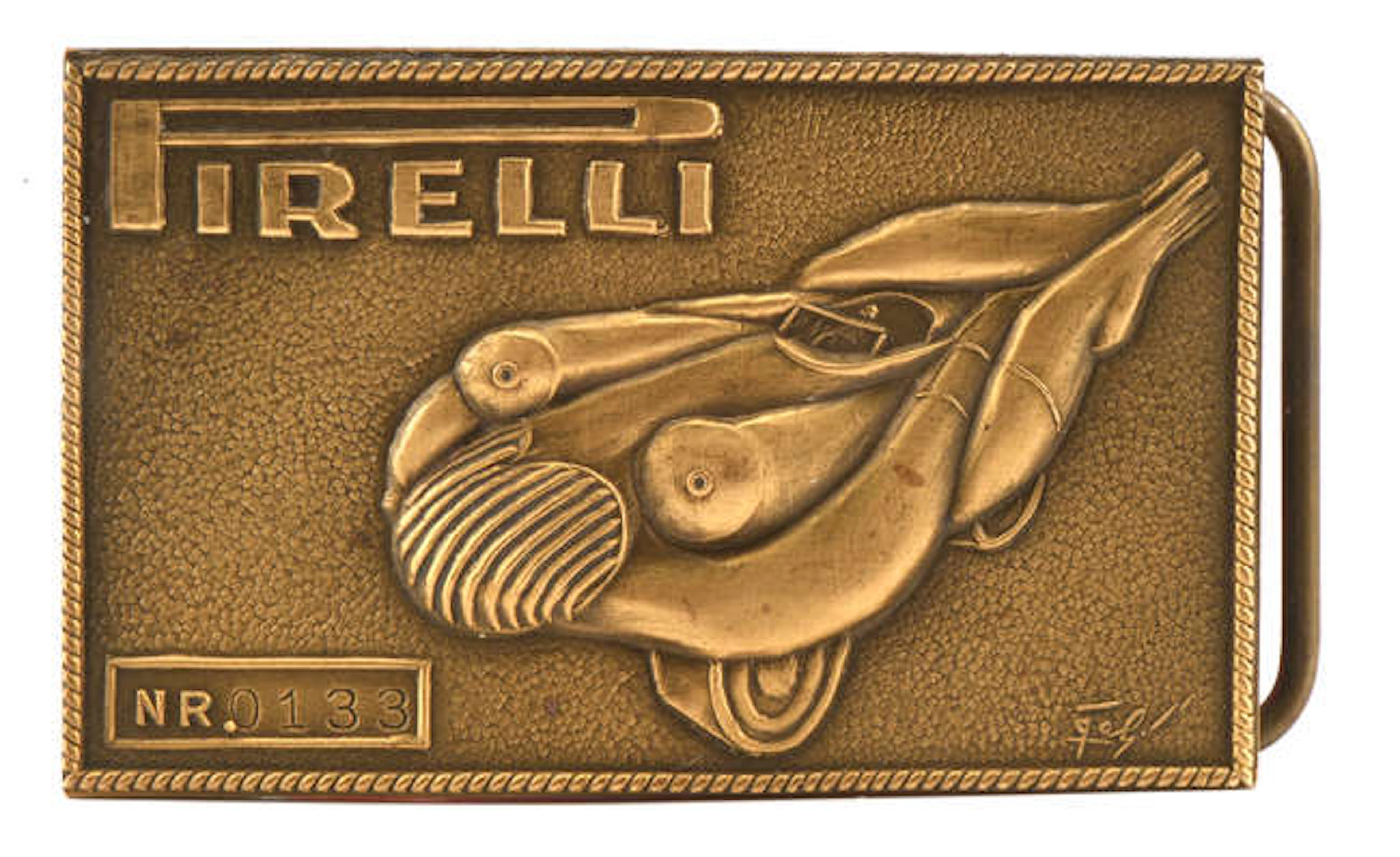 An erotic Pirelli belt buckle designed by Salvador Dali (1904-1989)