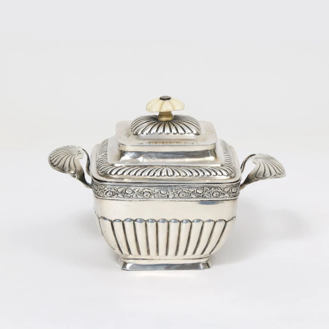 SUGAR BOWL with lid Decorated with floral garlands Engraved and chased