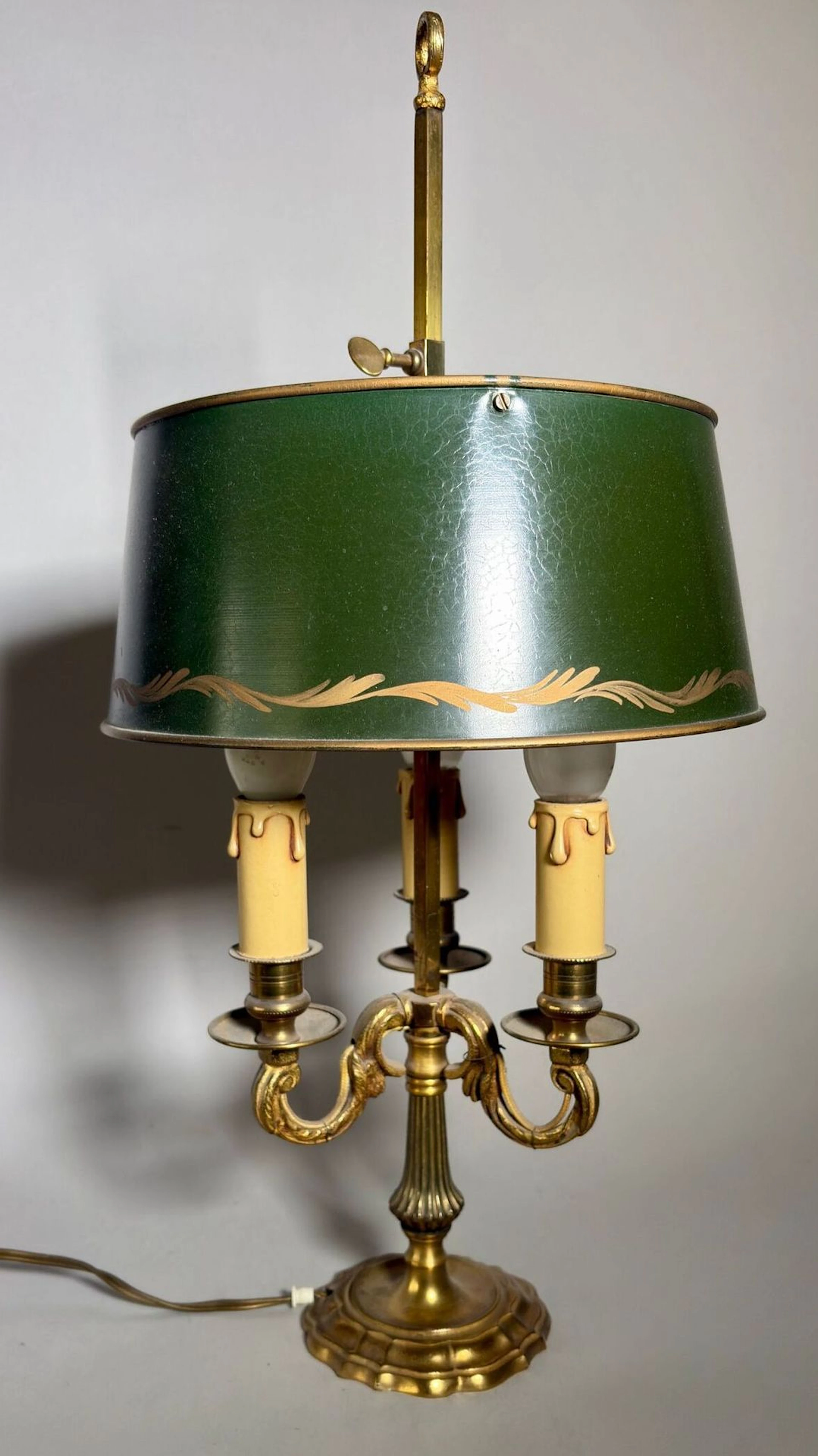 Three-arm brass hot-water bottle lamp with a dark green pain - Lot 238
