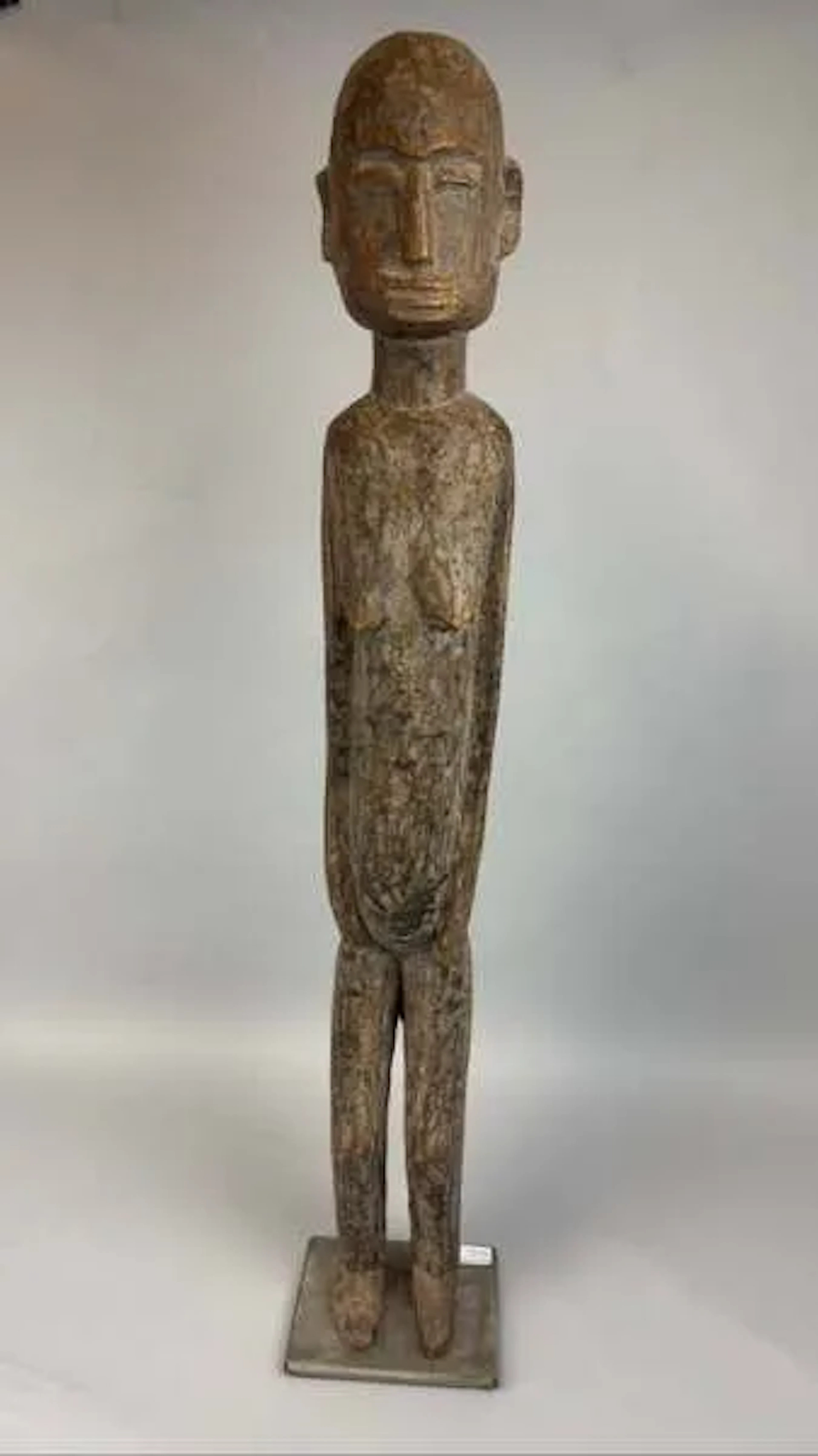 Carved wooden female statue, a slender standing figure with - Lot 226