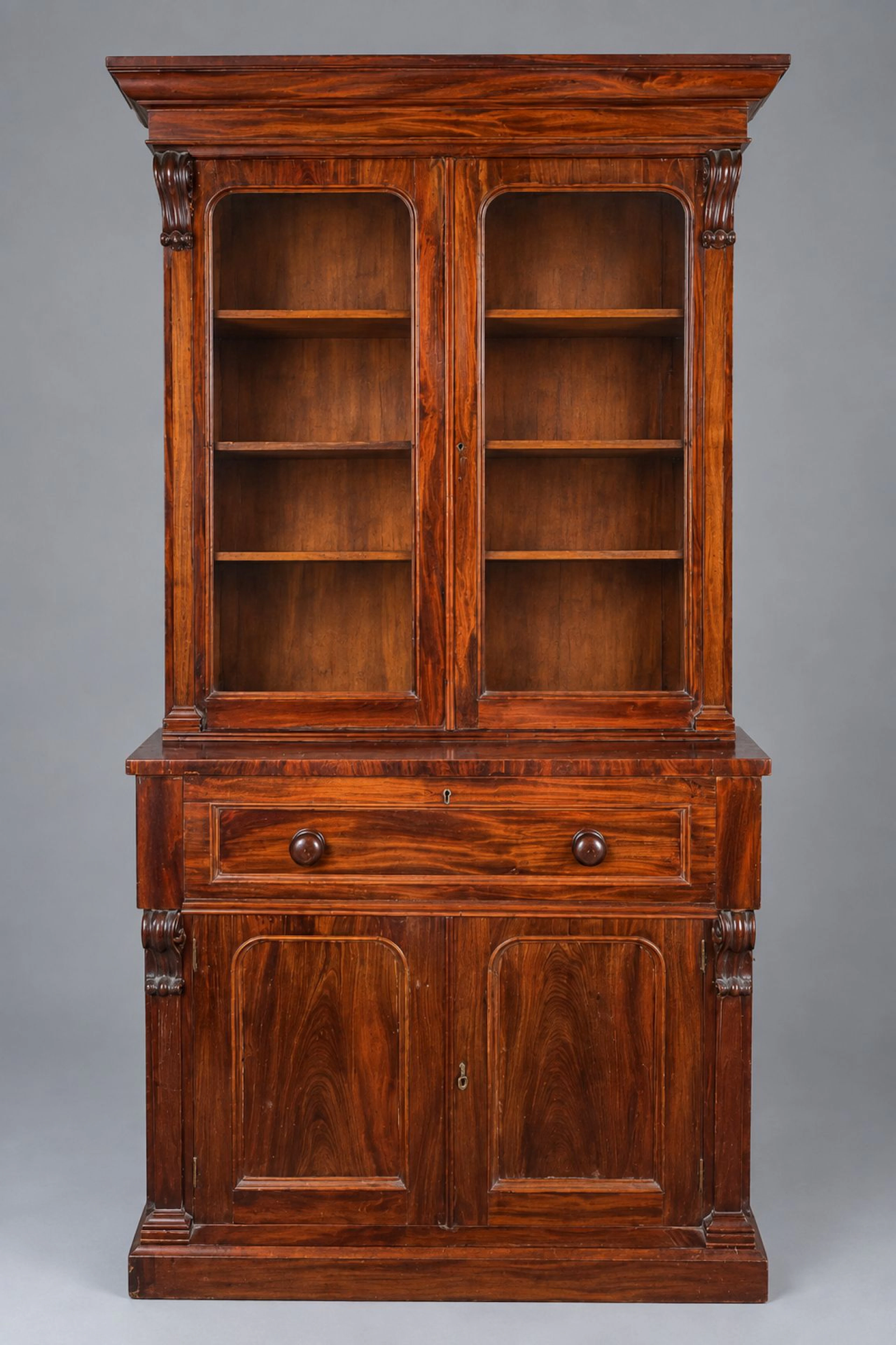 Bookcase made of mahogany and mahogany veneer; the upper sec - Lot 255