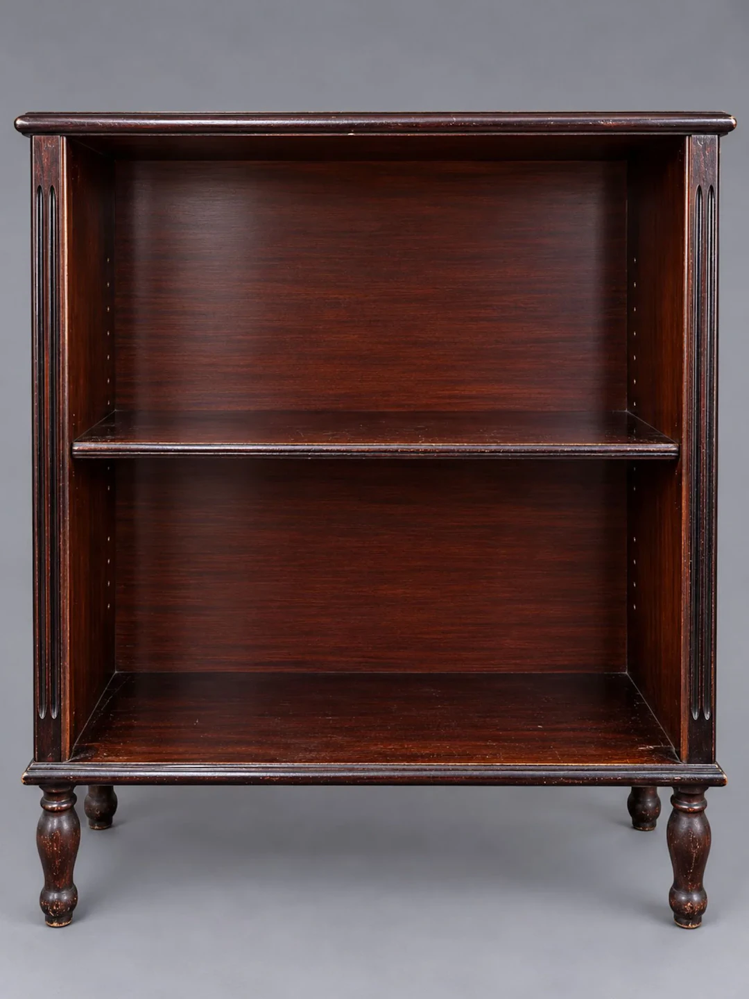 Dark-stained wooden bookcase with two shelves, fluted side p - Lot 275