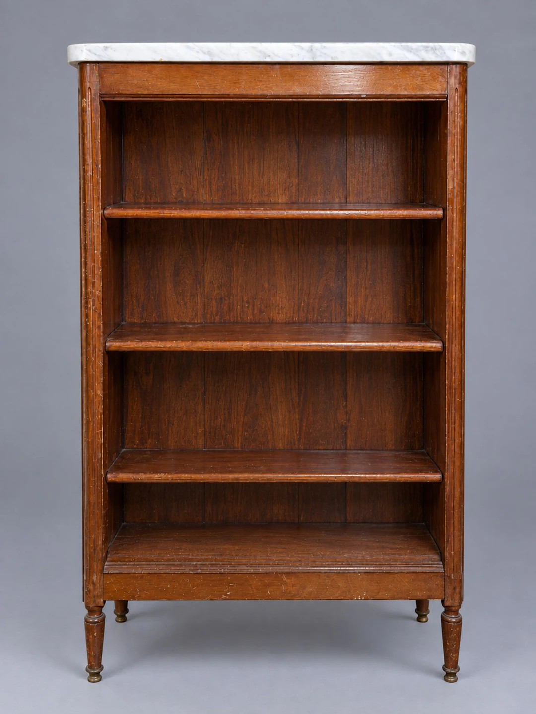 A bookcase known as a “bibus,” made of wood veneer with four - Lot 266