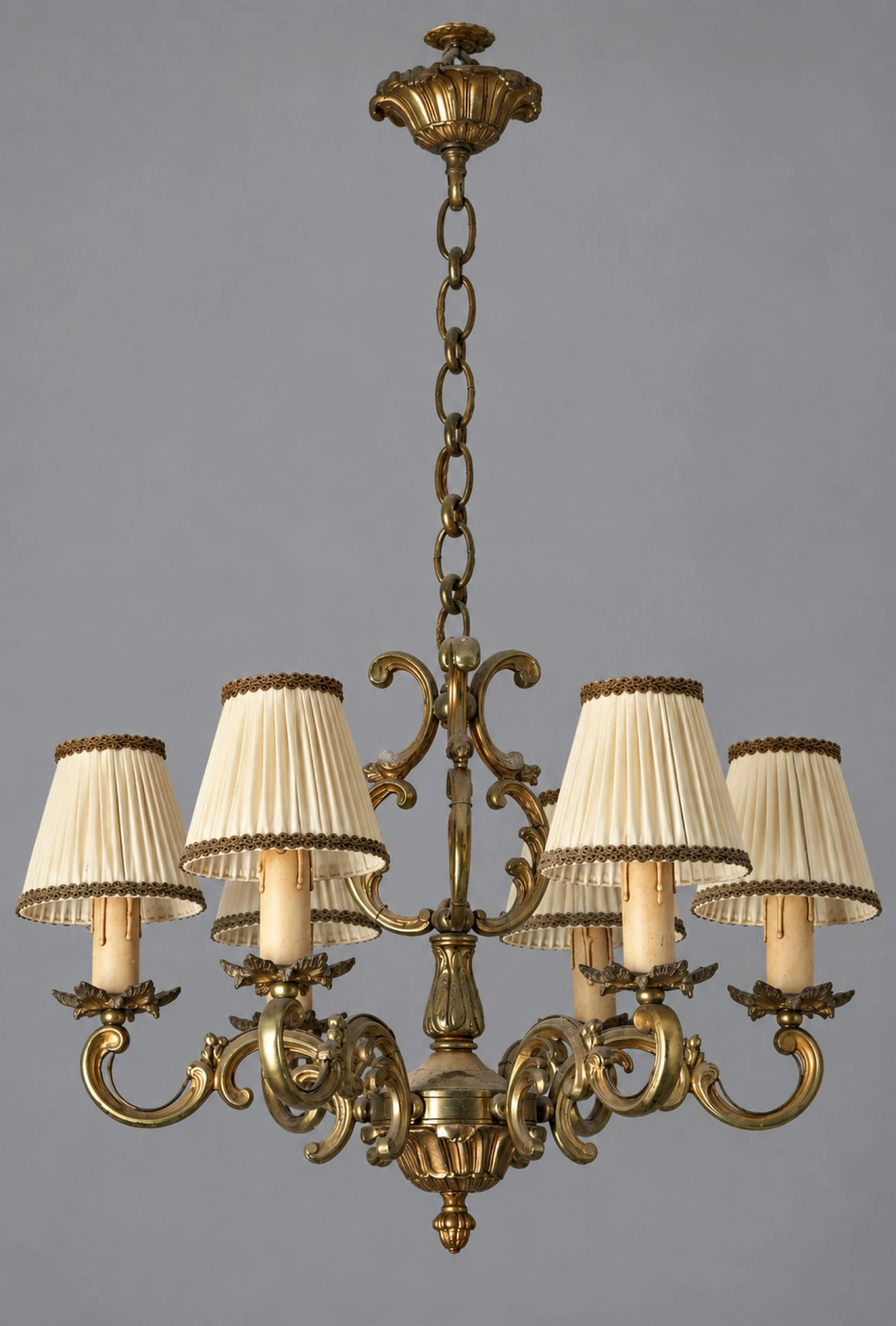 Brass and gilded bronze chandelier with six dynamically shap - Lot 248
