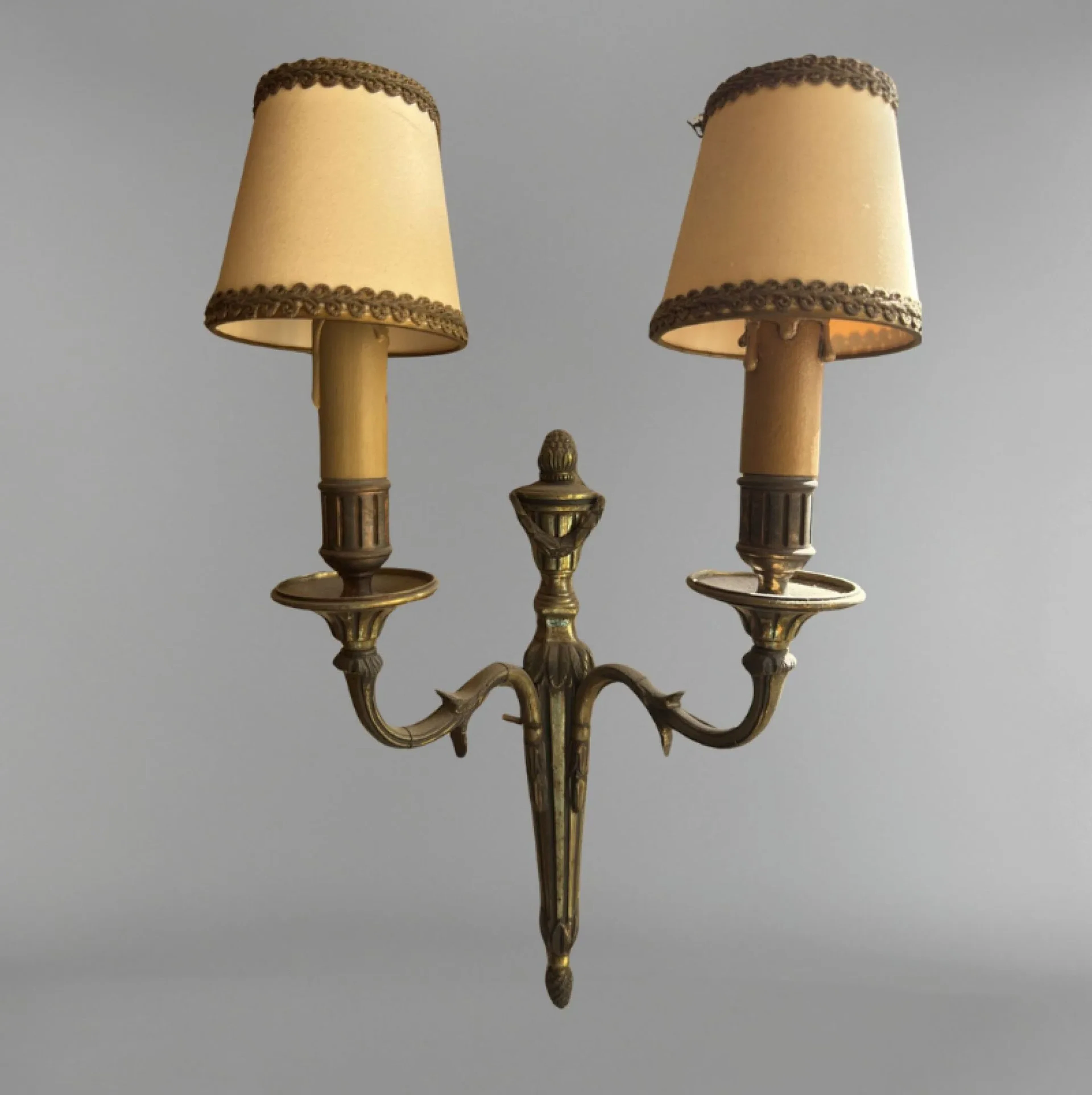 Pair of brass wall sconces with two ornate arms, featuring a - Lot 241