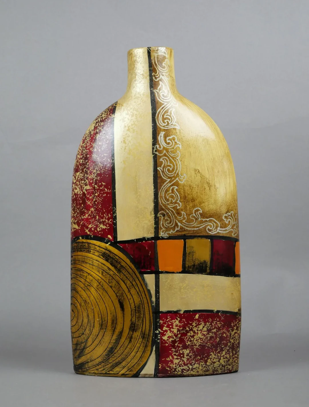 Brass bottle-shaped vase with a polychrome geometric design - Lot 191