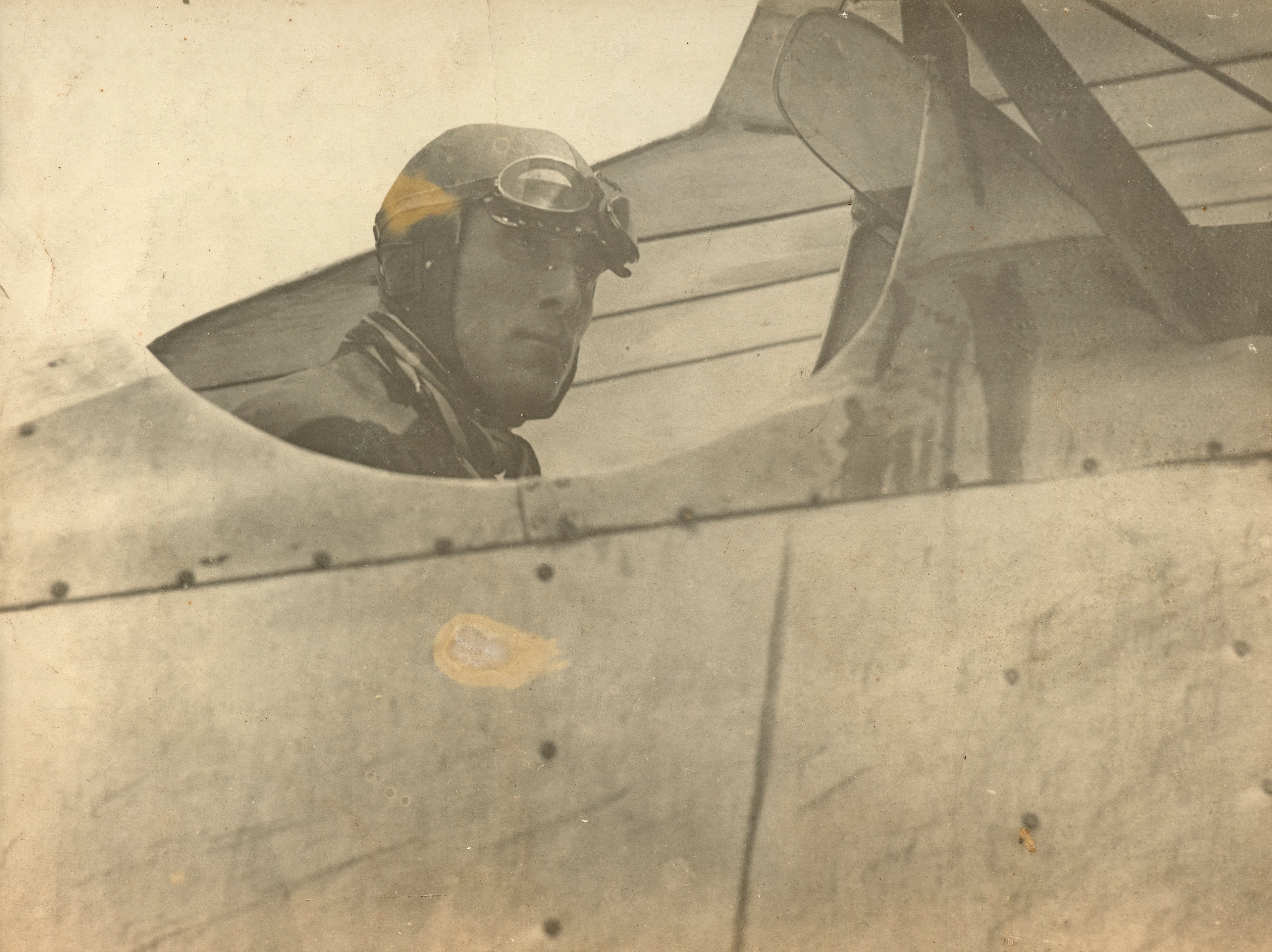 DEUX PHOTOGRAPHIES DE JEAN MERMOZ Mermoz aux commandes de son appareil